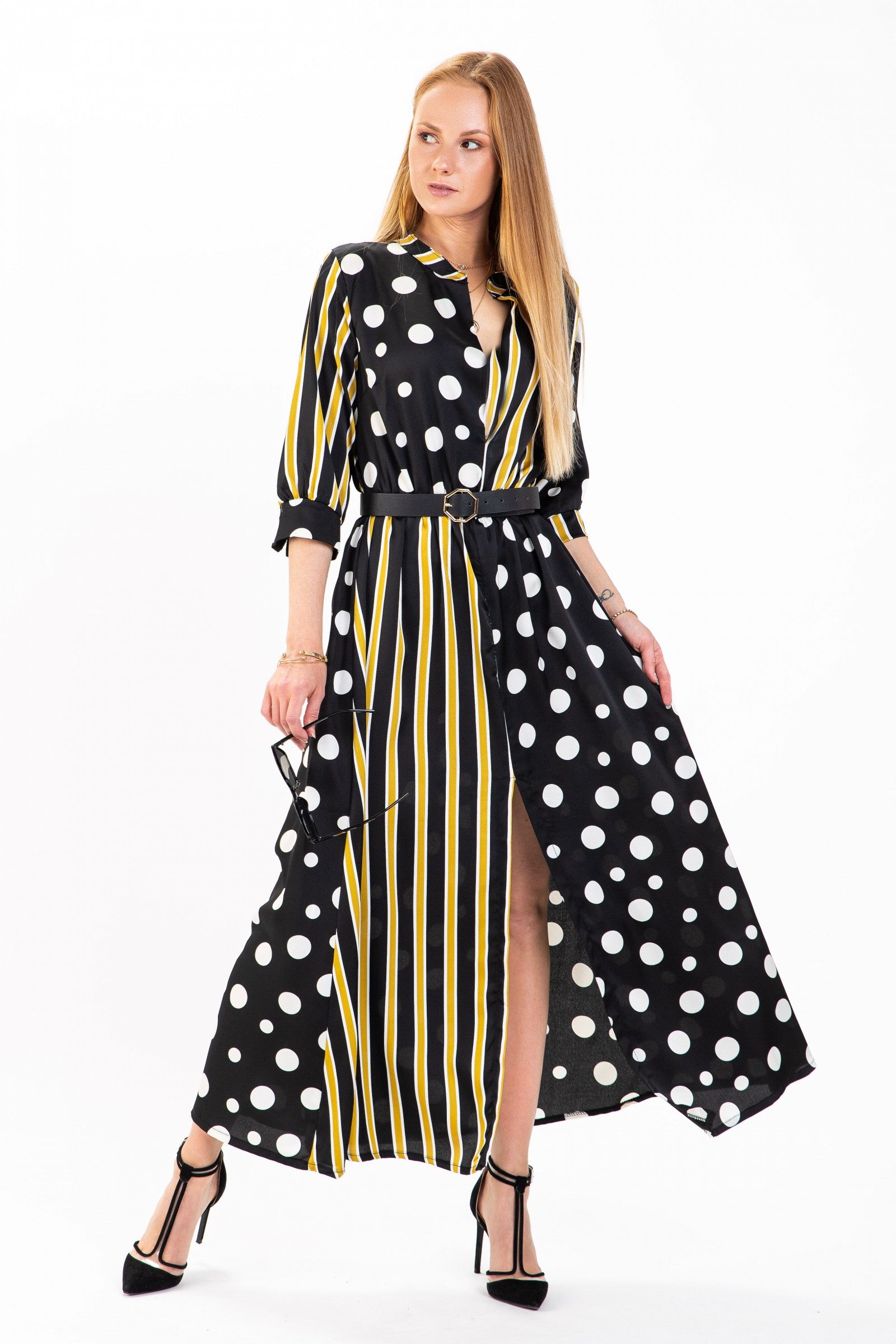 A stylish DRESS MORI maxi dress featuring a 'V' neck, 3/4 sleeves, and a long skirt with a front cutout, made from 100% polyester.