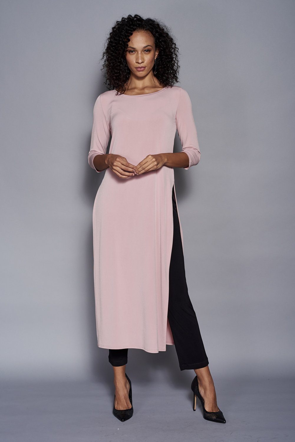 A stylish Dress Over Pant in Rose color featuring high slits, made from soft stretch knit jersey, perfect for versatile styling.