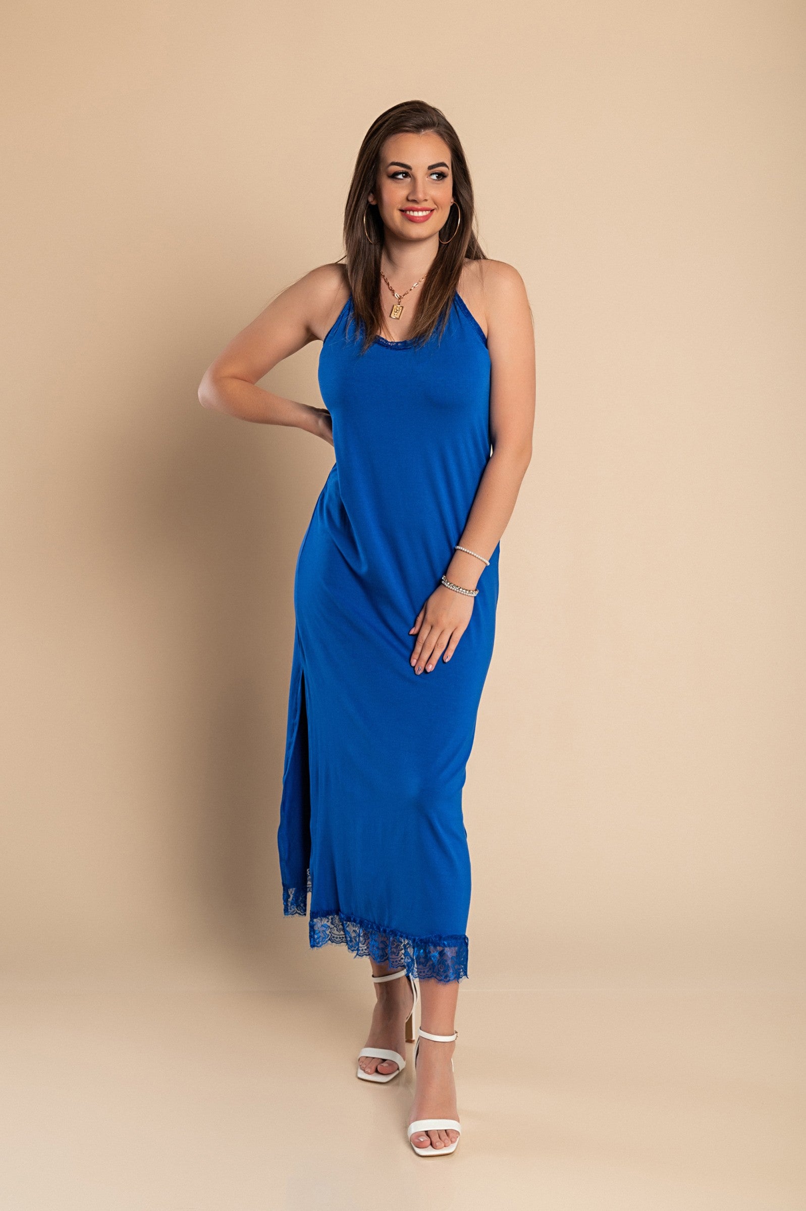 Elegant blue DRESS PRIMAROSA featuring lace details, 'V' neck, and thin straps, perfect for sophisticated occasions.