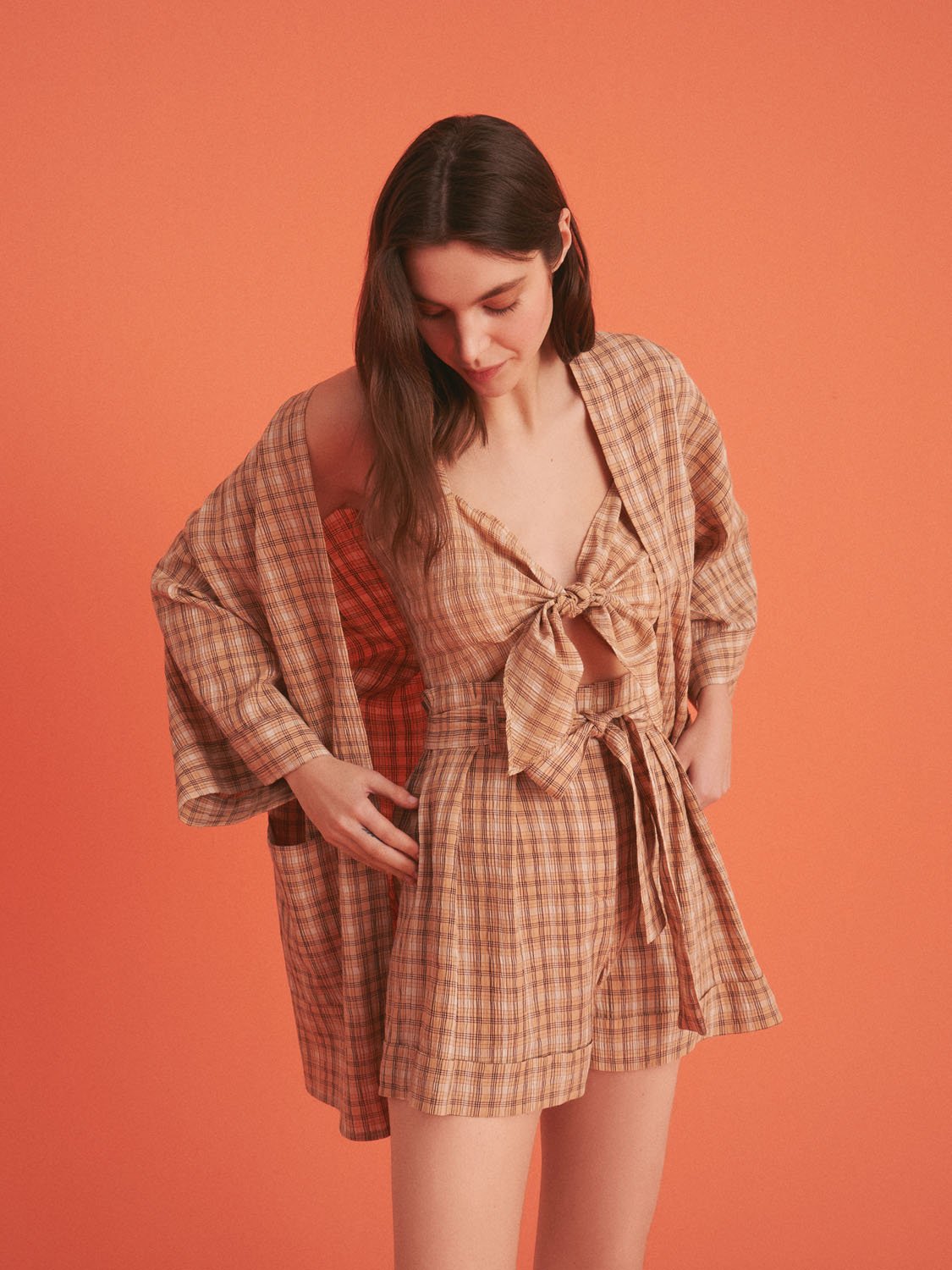 A stylish Dropped Shoulder Plaid Kimono with elbow-length sleeves, featuring patch pockets and side slits, perfect for summer wear.