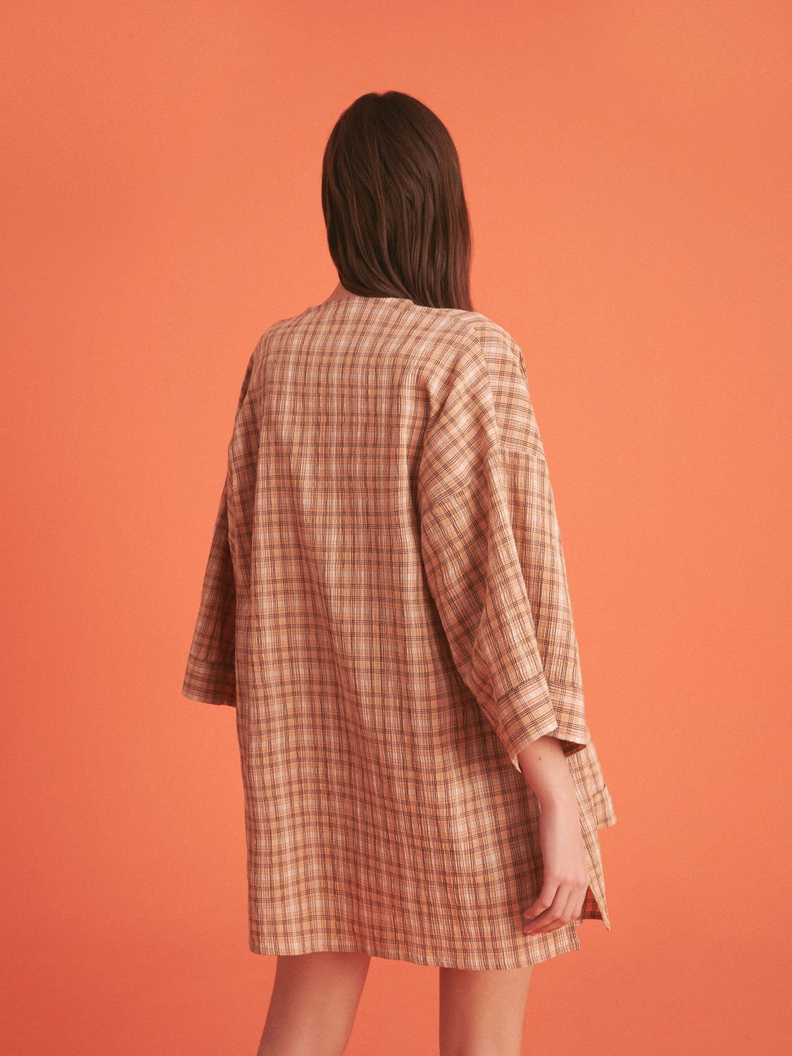 A stylish Dropped Shoulder Plaid Kimono with elbow-length sleeves, featuring patch pockets and side slits, perfect for summer wear.