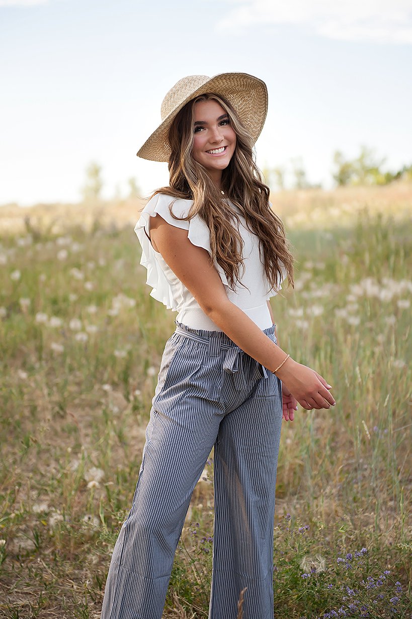 DT Izzy Belted Striped Palazzo Pants in grey and white, showcasing a stylish design with a belt and wide legs.