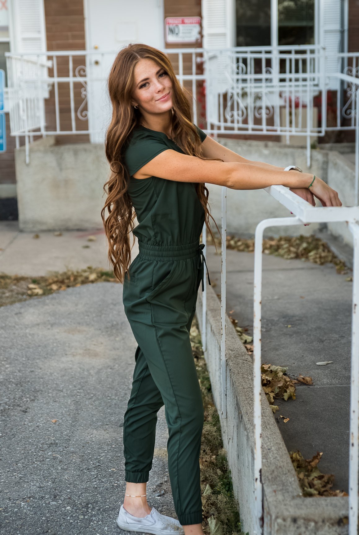 DT UNITY Jumpsuit in Green Canyon featuring cap sleeves, elastic waist, and pockets, perfect for women of all sizes.