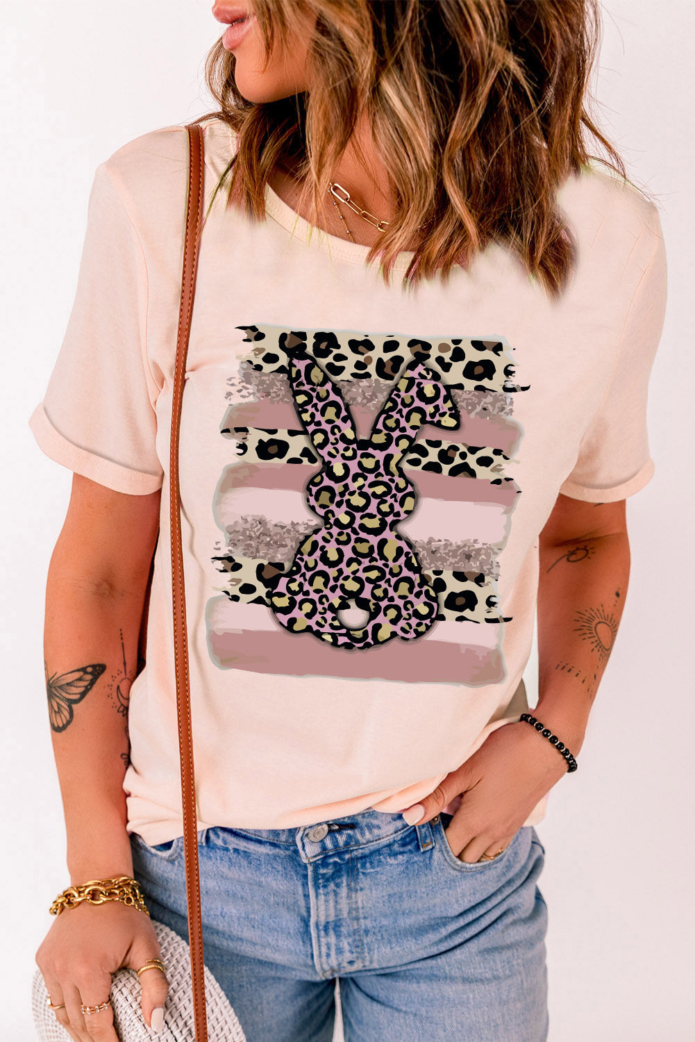 Easter Leopard Bunny Graphic T-Shirt featuring a playful leopard bunny design on a casual tee, perfect for spring celebrations.