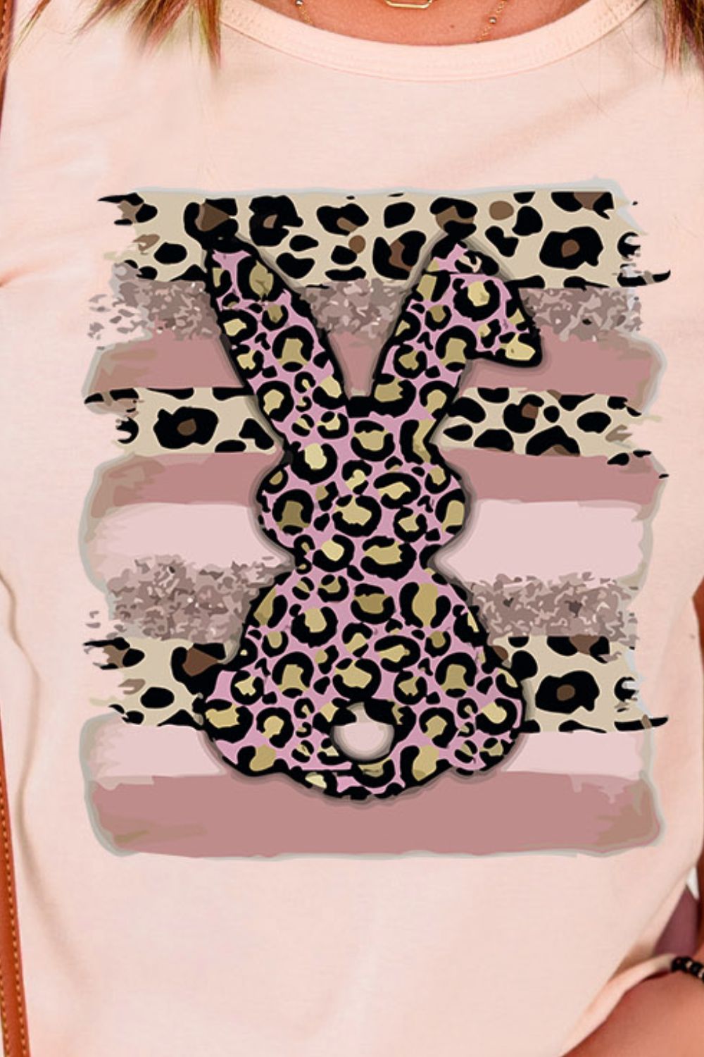 Easter Leopard Bunny Graphic T-Shirt featuring a playful leopard bunny design on a casual tee, perfect for spring celebrations.