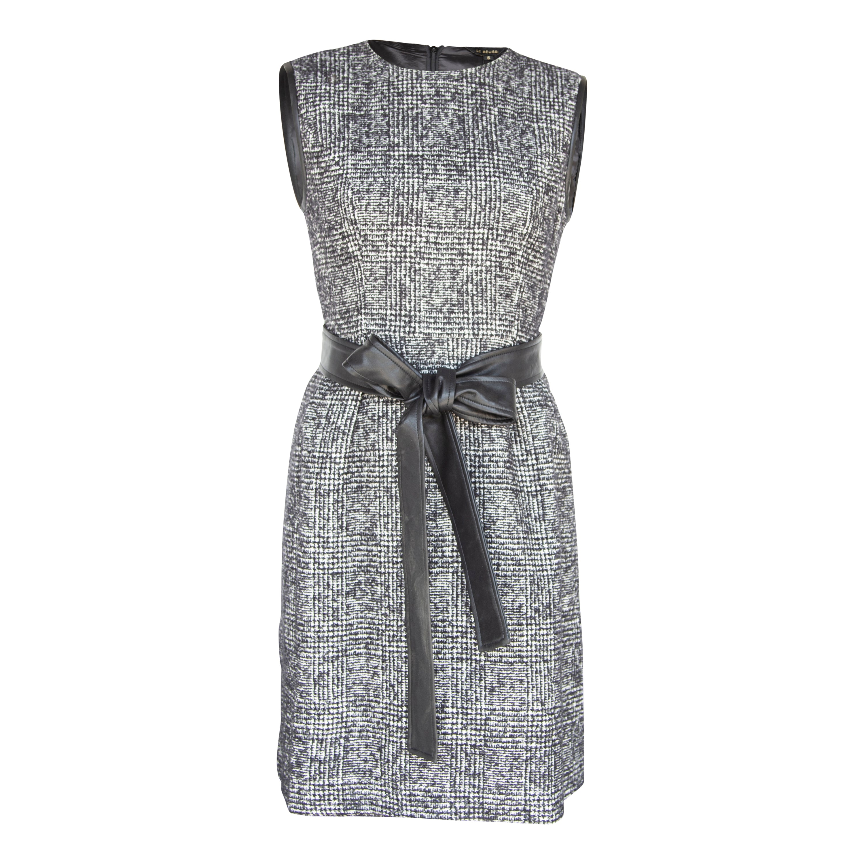 Ebony Mini Tweed Dress displayed on a mannequin, showcasing its elegant design and premium fabric.