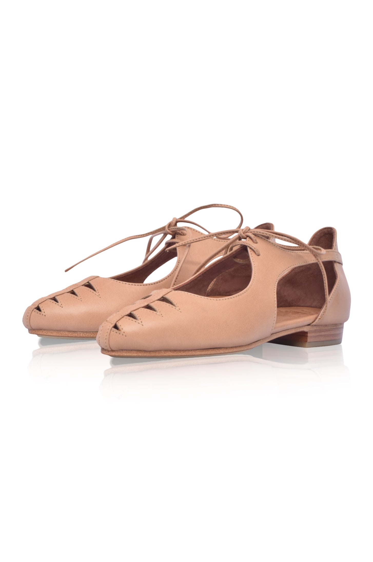 Eden Pointy Toe Ballet Flats in genuine leather with unique cutouts, showcasing a stylish and elegant design.