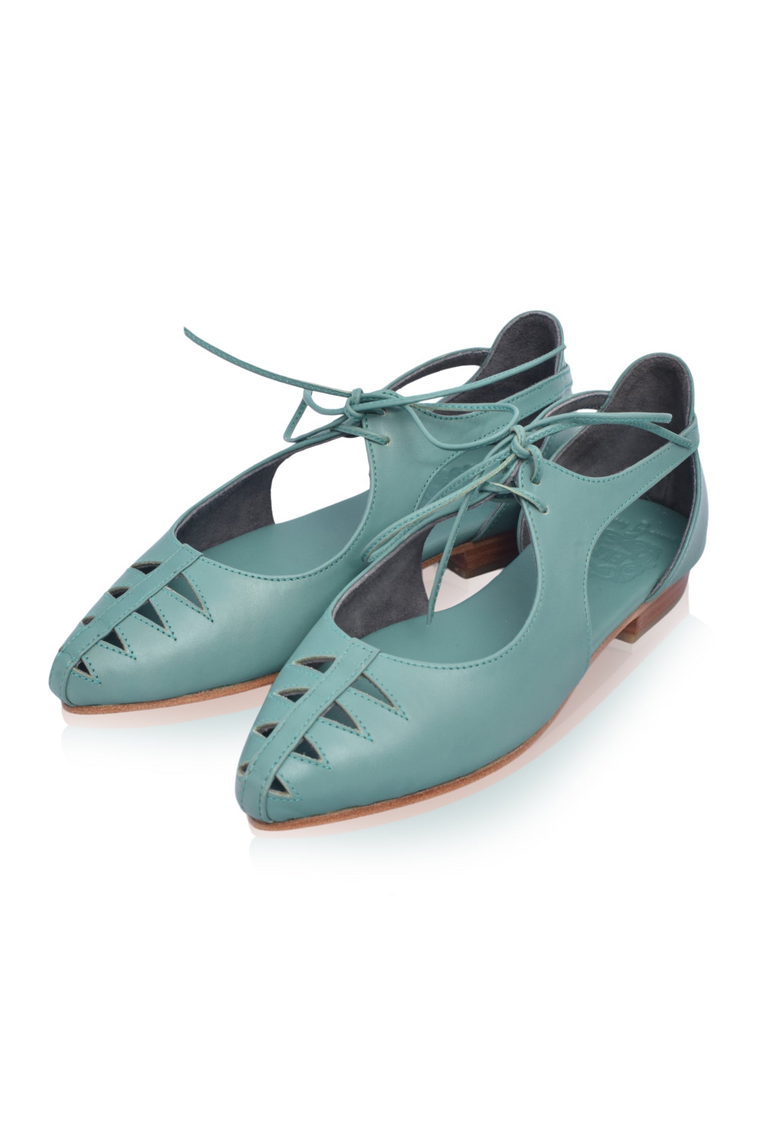 Eden Pointy Toe Ballet Flats in genuine leather with unique cutouts, showcasing a stylish and elegant design.