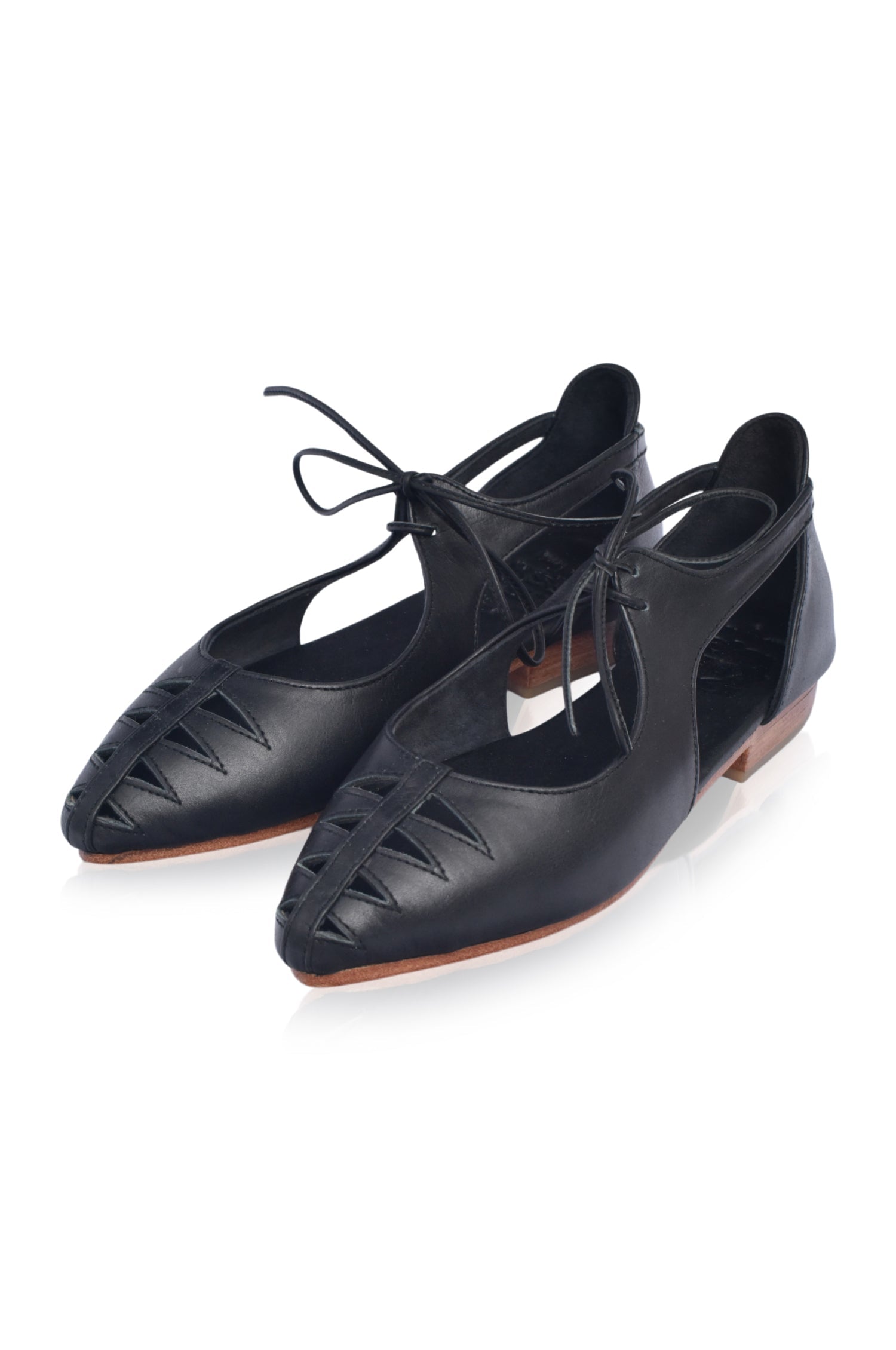 Eden Pointy Toe Ballet Flats in genuine leather with unique cutouts, showcasing a stylish and elegant design.