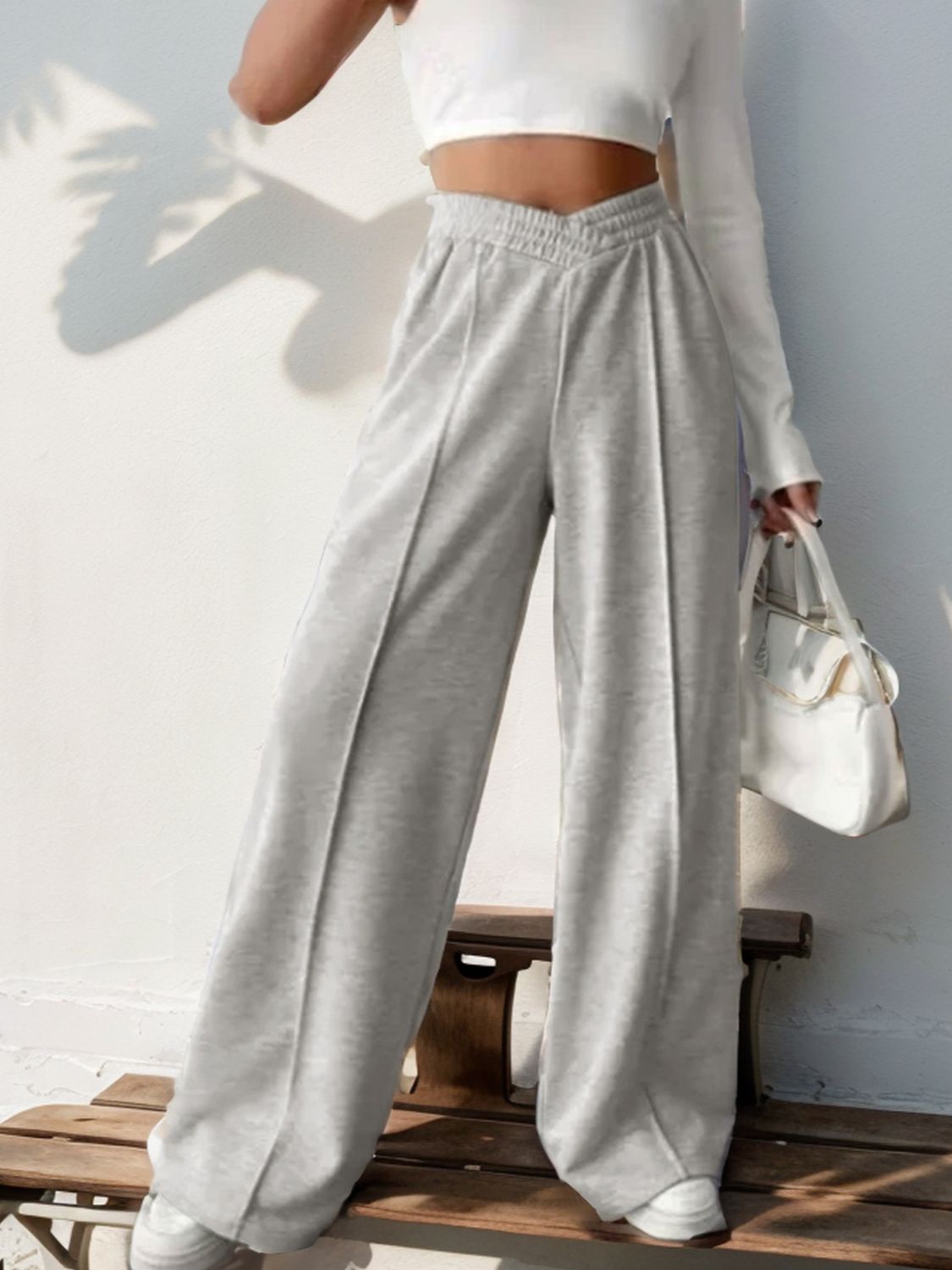 A pair of stylish Elastic Waist Wide Leg Pants in a neutral color, showcasing the wide leg design and elastic waistband.