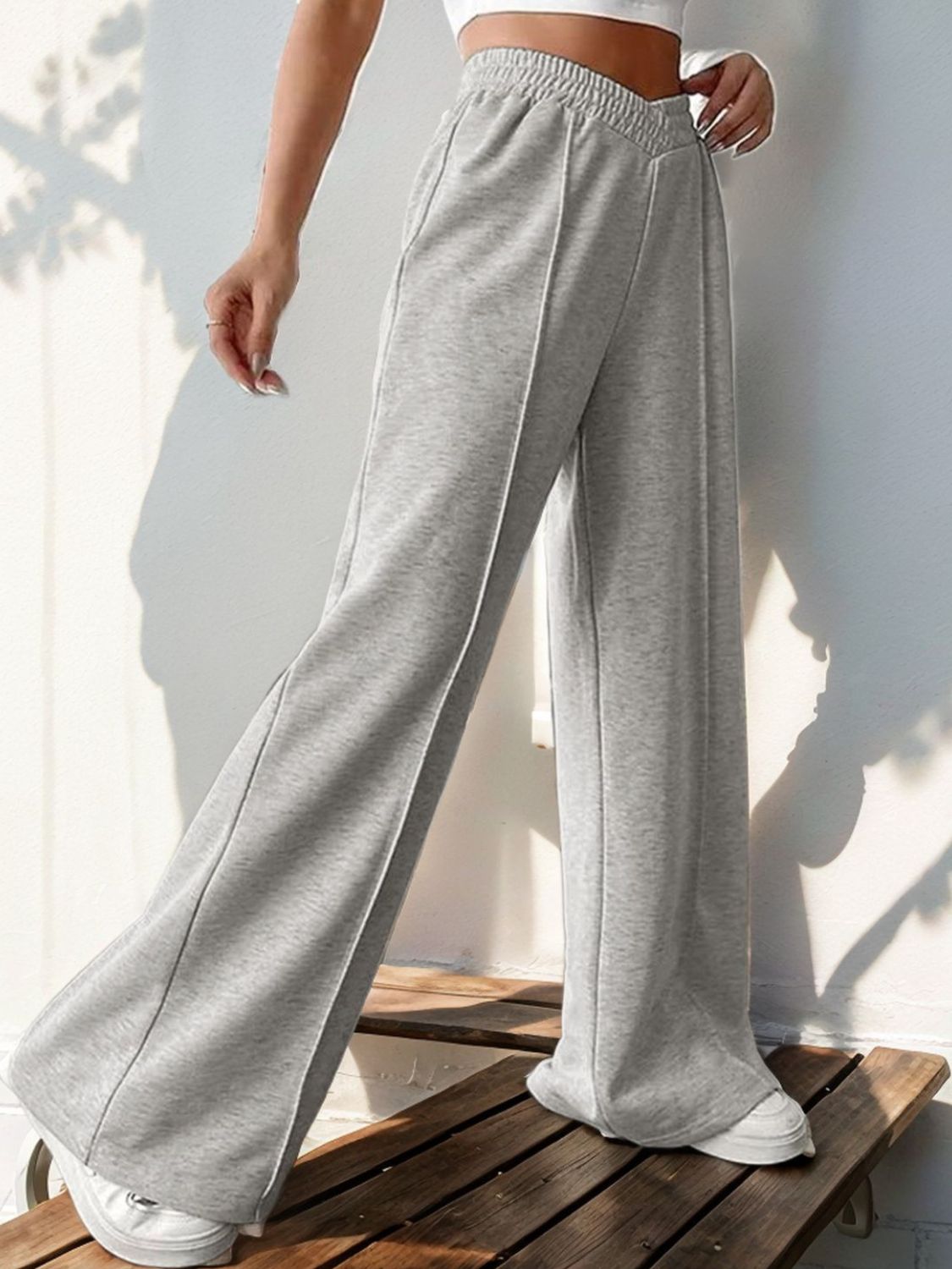 A pair of stylish Elastic Waist Wide Leg Pants in a neutral color, showcasing the wide leg design and elastic waistband.