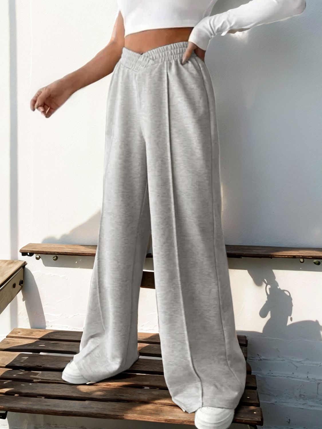 A pair of stylish Elastic Waist Wide Leg Pants in a neutral color, showcasing the wide leg design and elastic waistband.