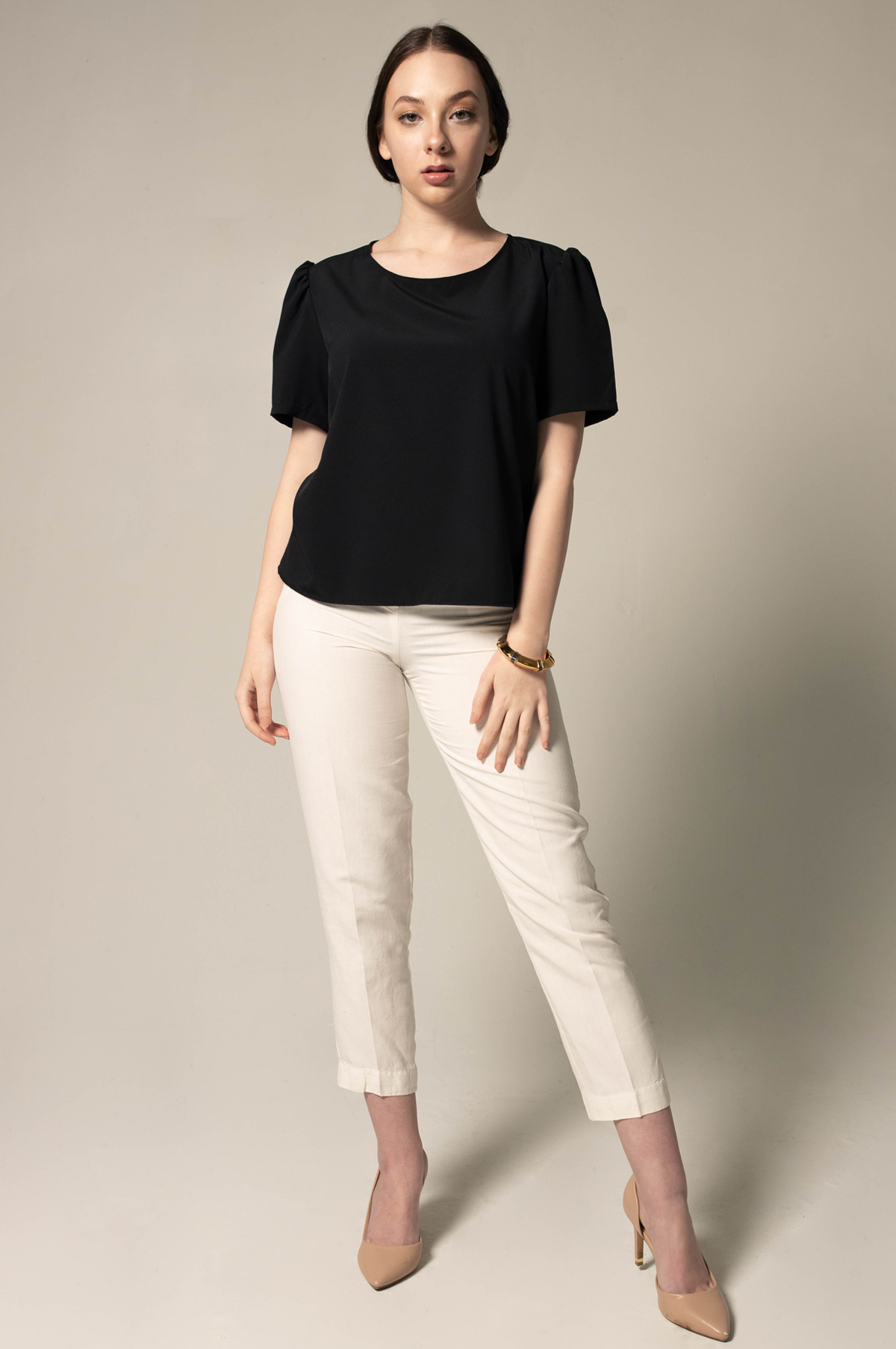 Elegance Round Neck Blouse in Black, featuring a classic round neck design, made from polyester and spandex, ideal for office and casual wear.