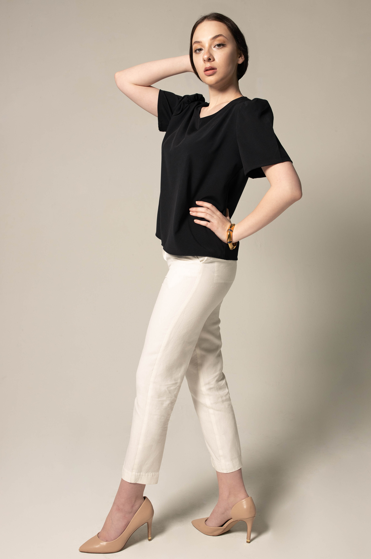 Elegance Round Neck Blouse in Black, featuring a classic round neck design, made from polyester and spandex, ideal for office and casual wear.