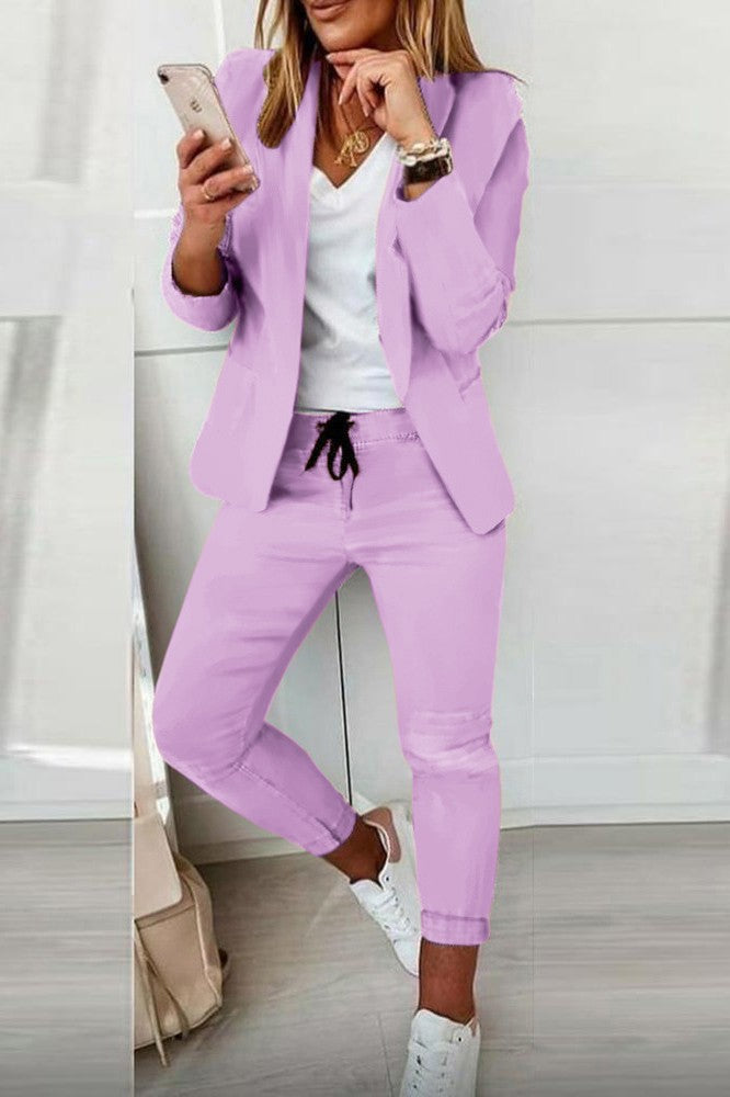 Elegant lilac blazer and pants set, featuring a classic collar and long sleeves, designed for comfort and style.