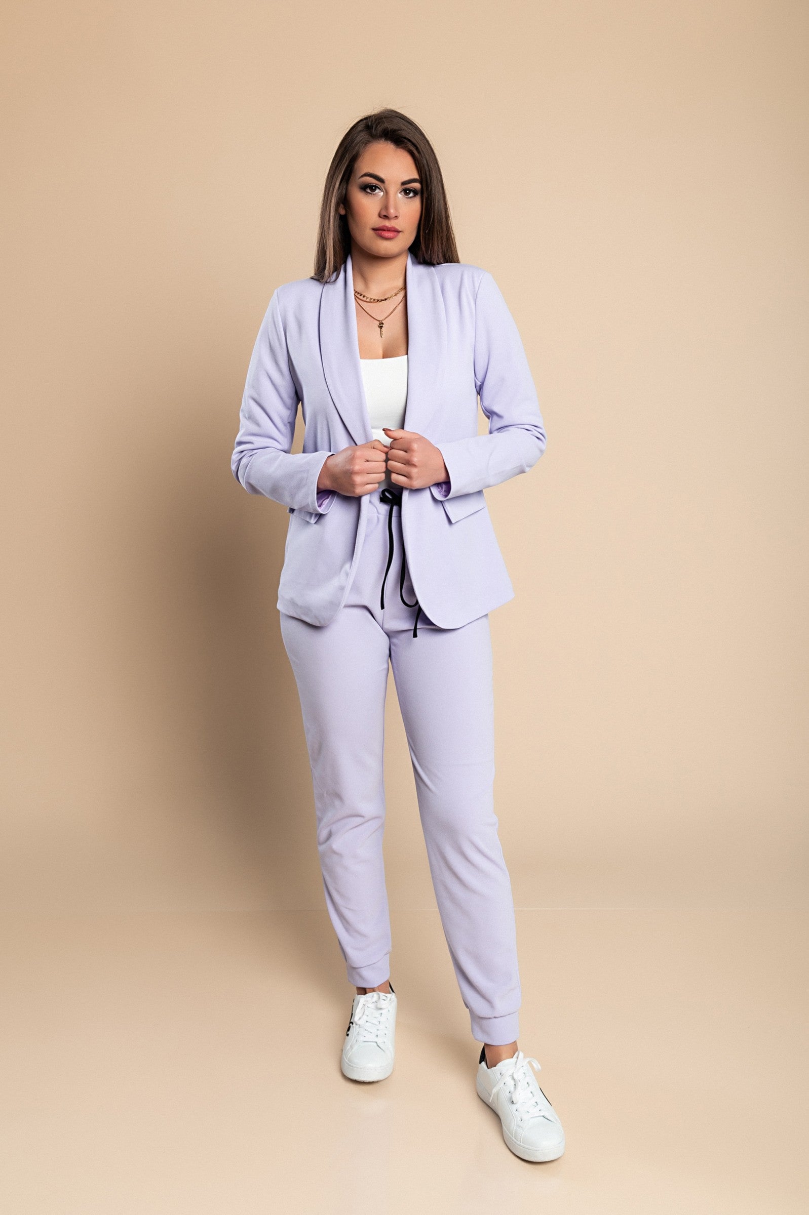 Elegant lilac blazer and pants set, featuring a classic collar and long sleeves, designed for comfort and style.