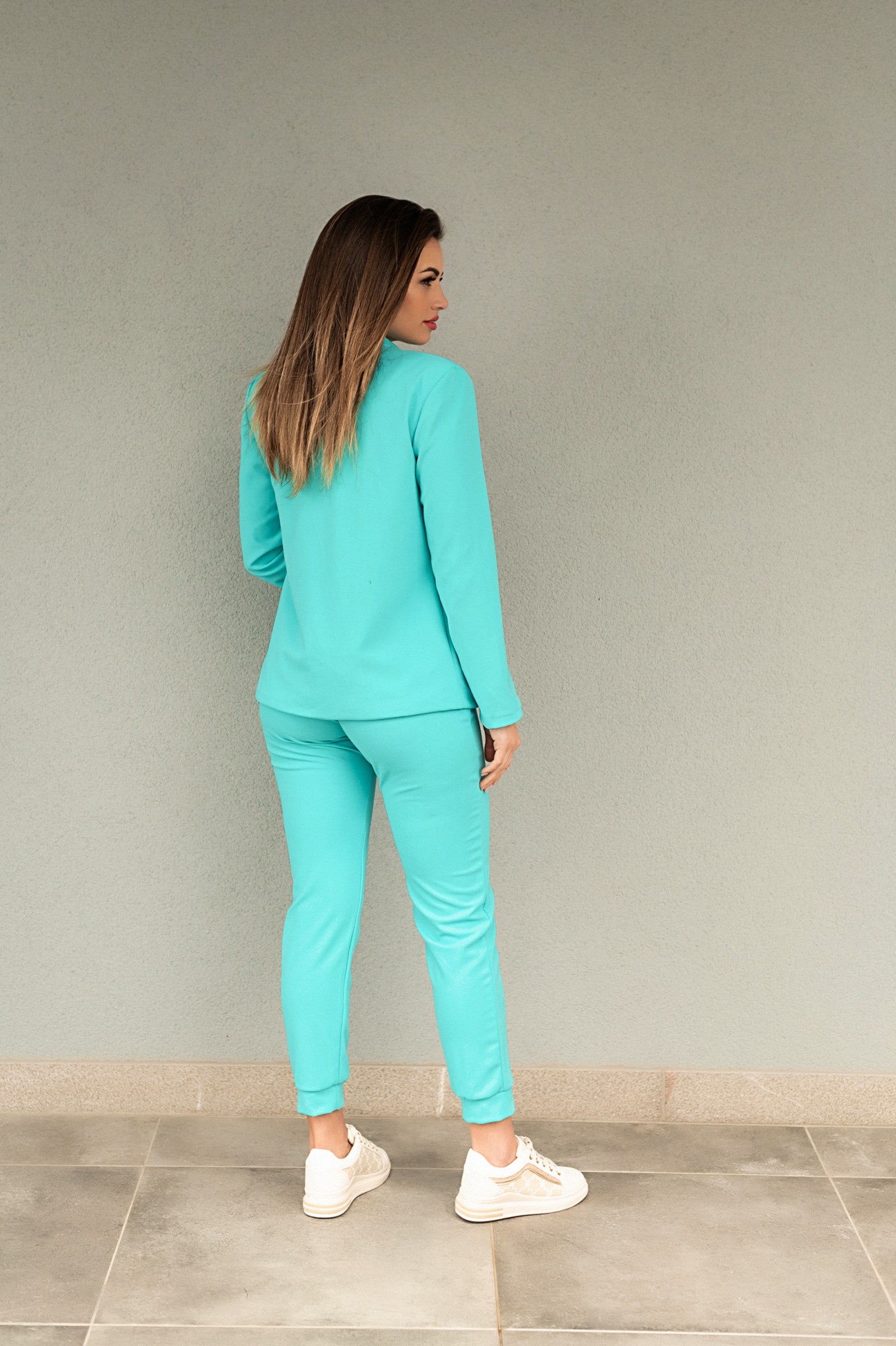 Elegant mint blazer and pants set Estrena, featuring a classic collar, long sleeves, and fitted trousers with an elastic drawstring waist.