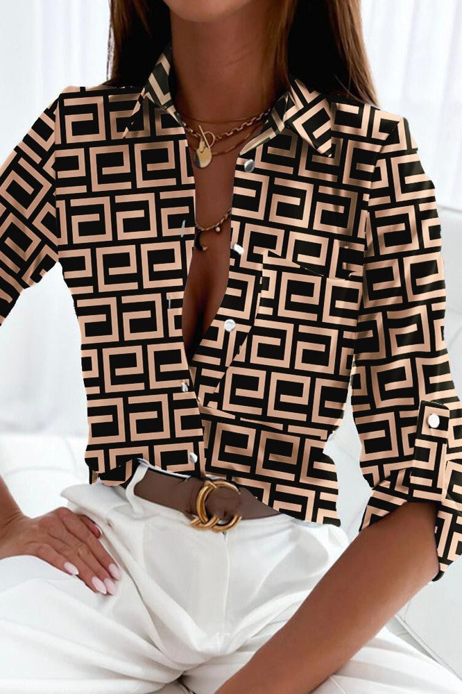 Elegant black and beige blouse with geometric print, featuring a classic collar and long sleeves, made of high-quality imitation satin.