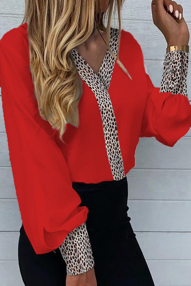 Elegant red blouse with leopard print, featuring a V neckline and long sleeves, made from high-quality imitation satin.