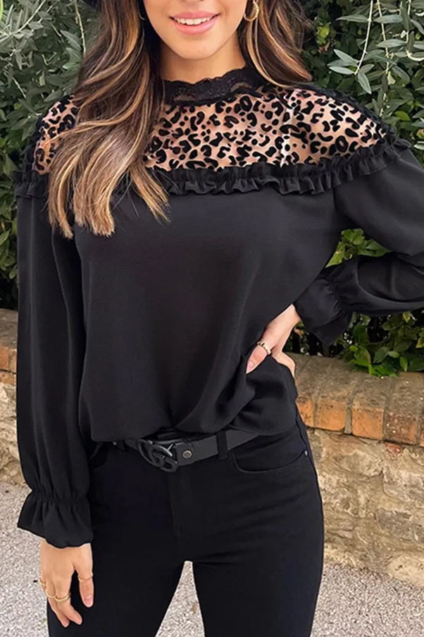 Elegant black blouse with ruffles and leopard print tulle neckline, featuring long sleeves and a loose fit.