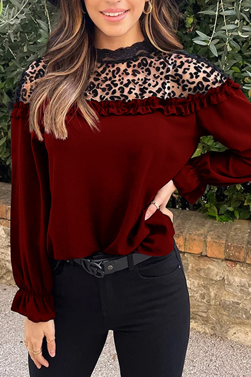 Elegant burgundy blouse with ruffles and leopard print tulle neckline, featuring long sleeves and a loose fit.