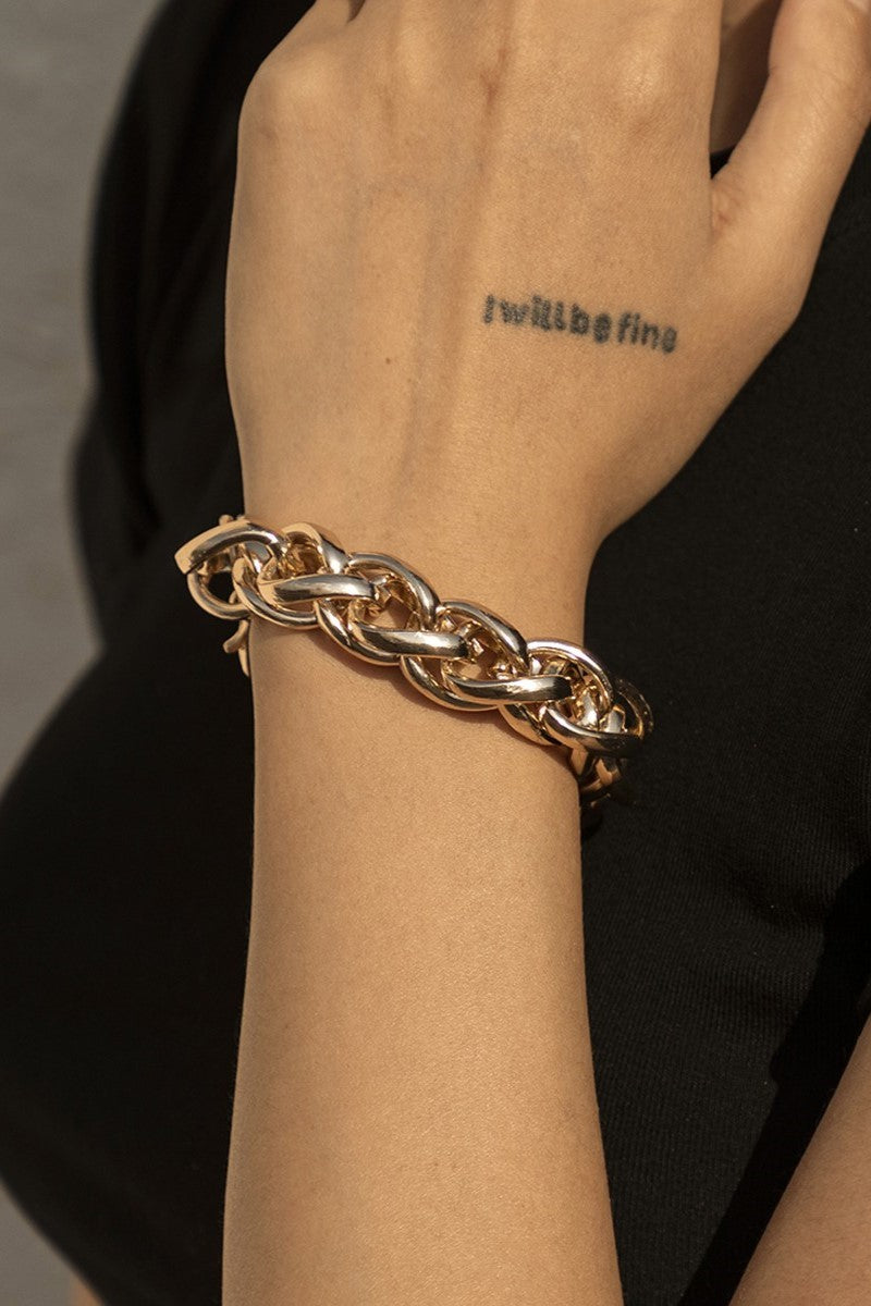 Elegant gold color bracelet Maripora with chain links, showcasing its stylish design and quality craftsmanship.