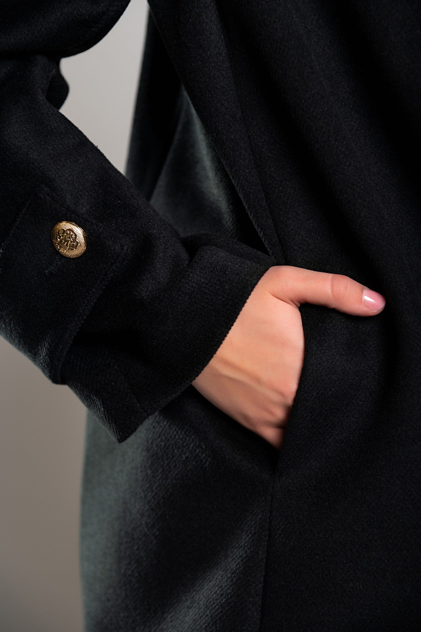 Elegant black coat Albineya with classic collar and zip fastening, made in Italy, showcasing high-quality soft fabric.