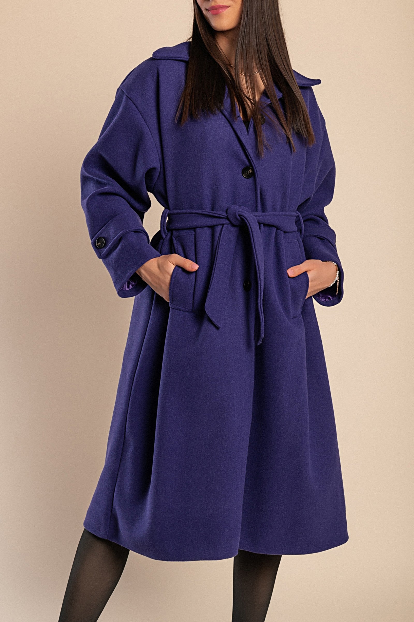 Elegant purple coat with buttons, featuring a classic collar, long sleeves, and a decorative belt, perfect for winter fashion.