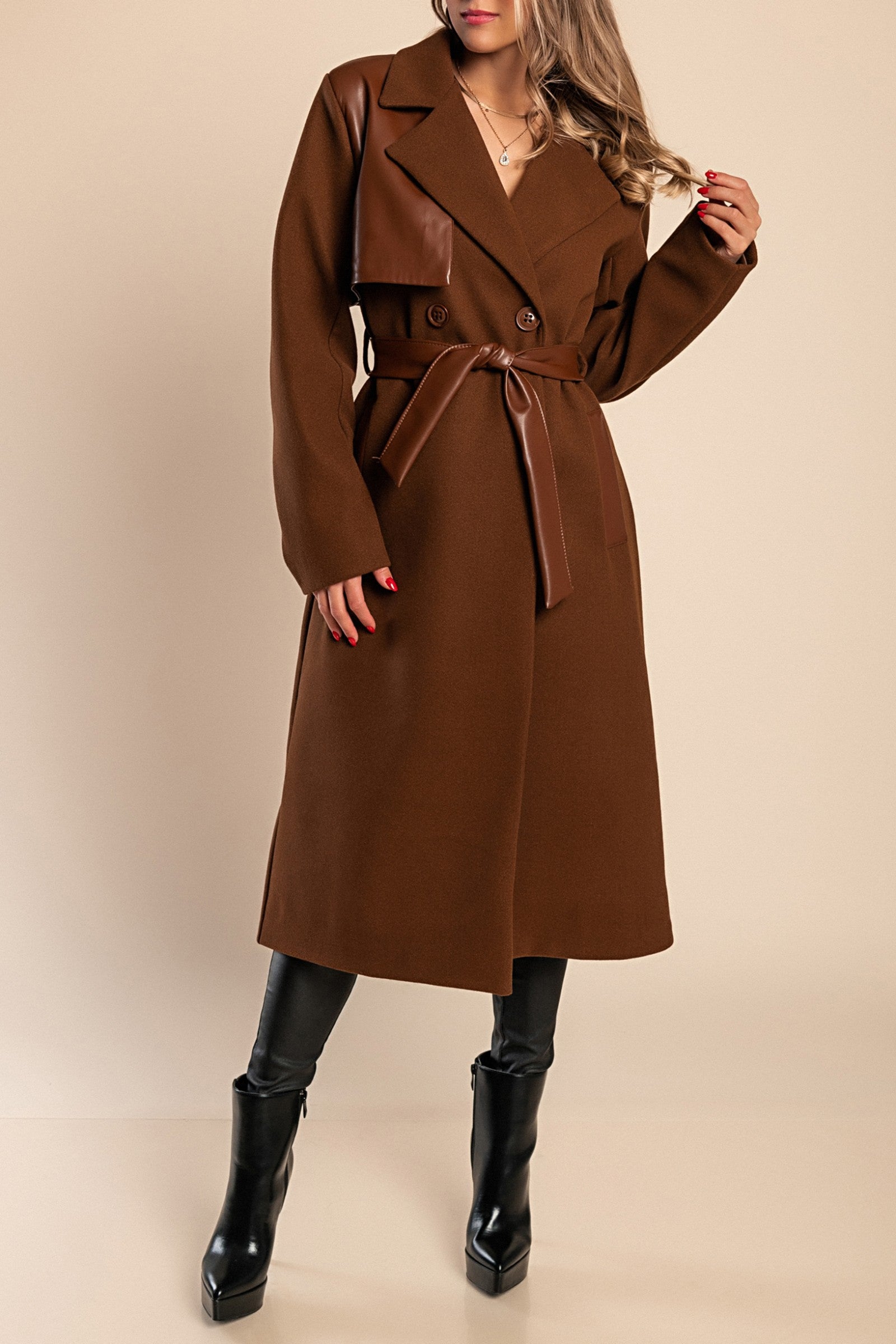 Elegant brown coat featuring faux leather details, classic collar, button closure, and decorative belt, perfect for stylish warmth.