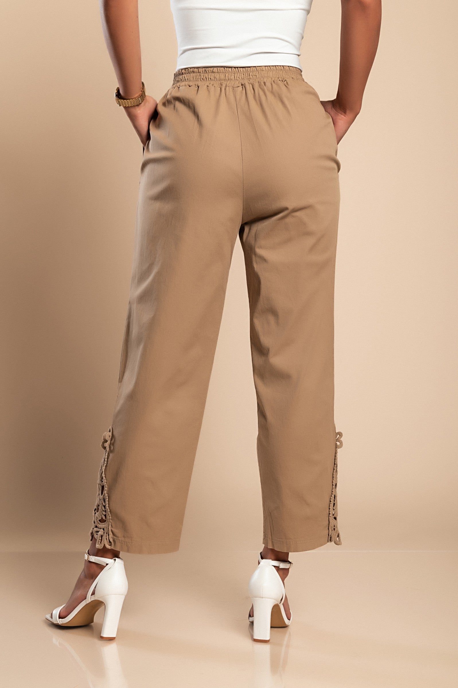 Elegant khaki cotton trousers with lace detailing, featuring an elastic and drawstring waist.