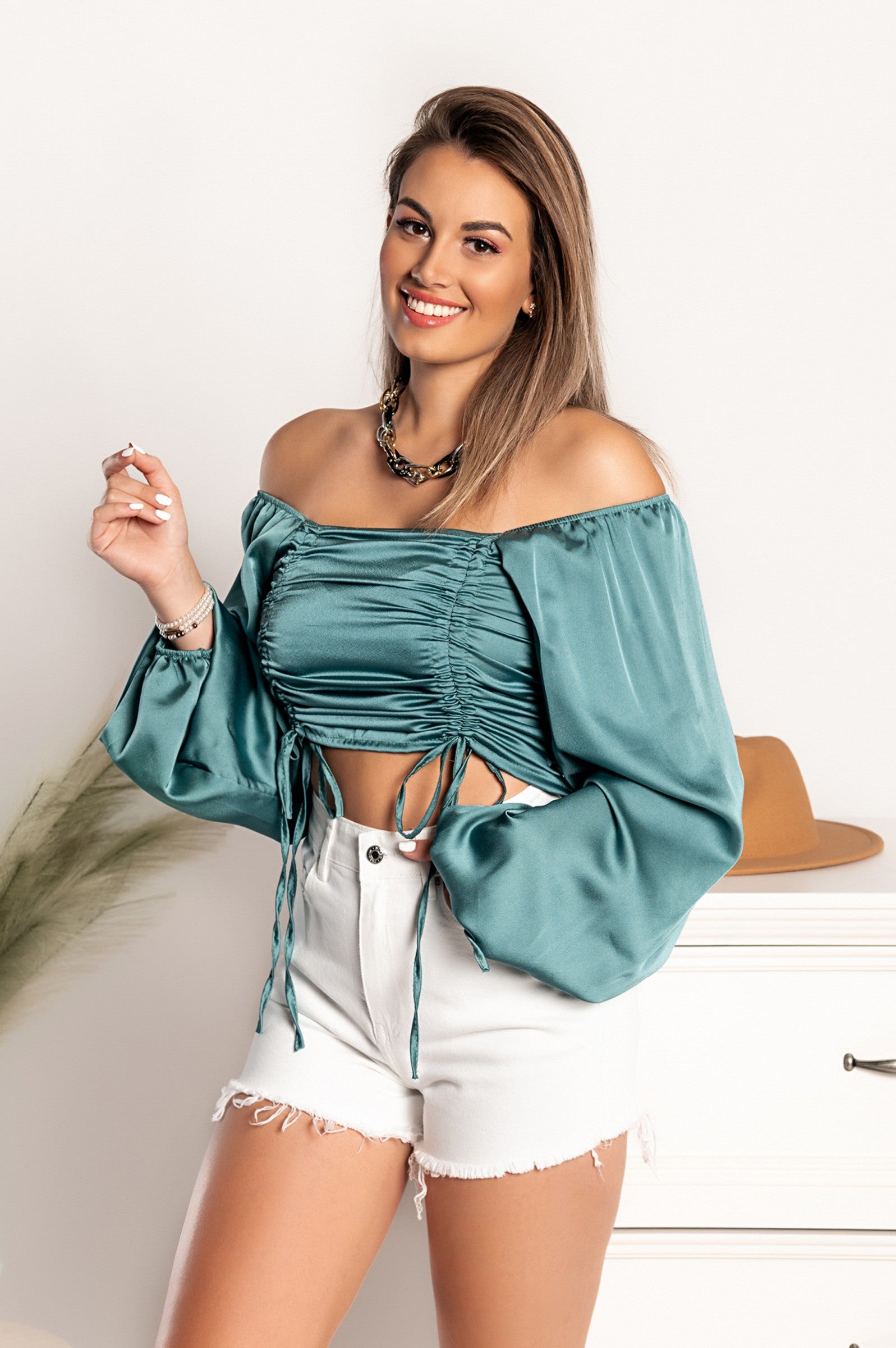 Elegant mint crop top with long loose sleeves and adjustable laces, made of high-quality imitation satin.