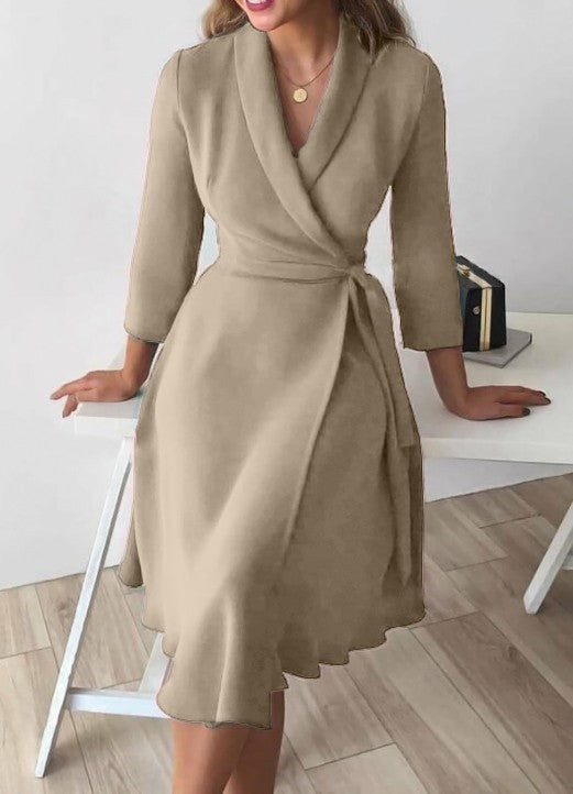 Elegant beige dress with a folding collar and 3/4 sleeves, featuring a deep V neckline and a loose mid-thigh skirt.