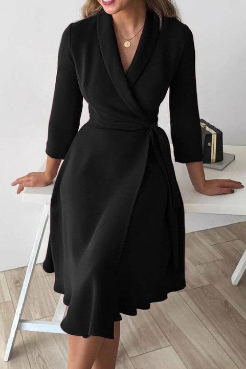 Elegant black dress with folding collar and 3/4 sleeves, featuring a deep V neckline and a loose mid-thigh skirt.