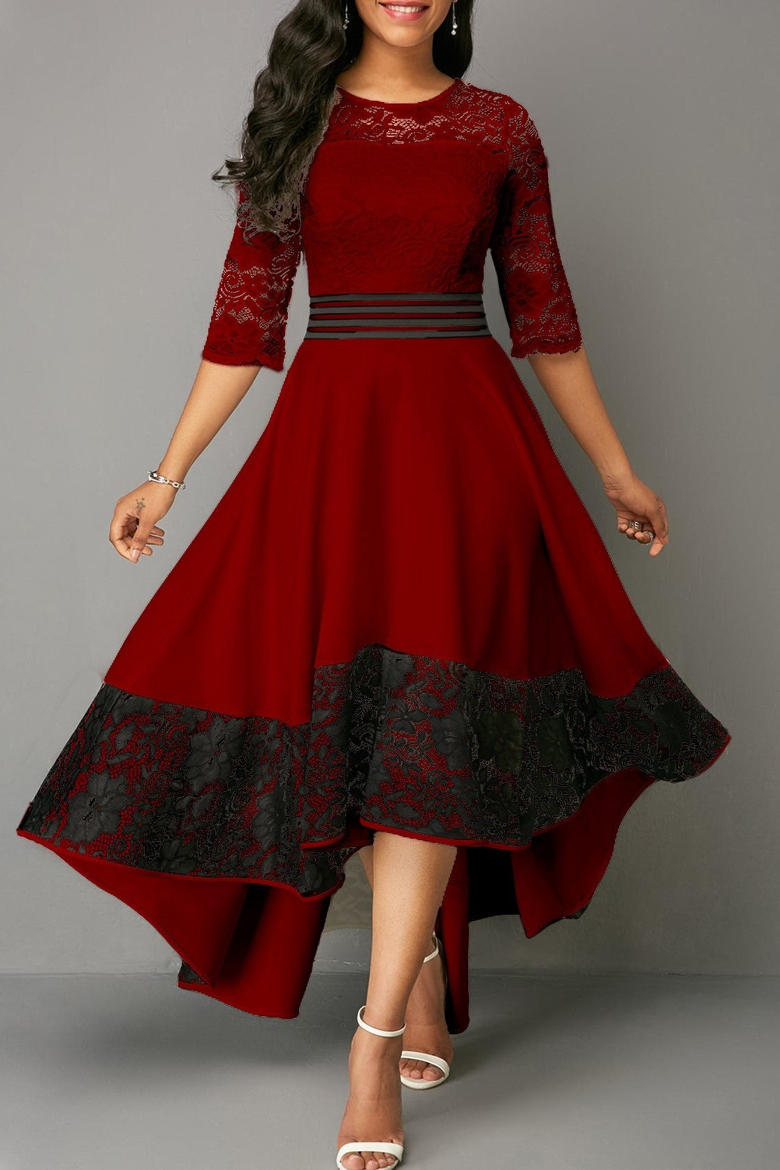 Elegant burgundy lace dress Bianca featuring asymmetrical design, sheer 3/4 sleeves, and lace detailing.