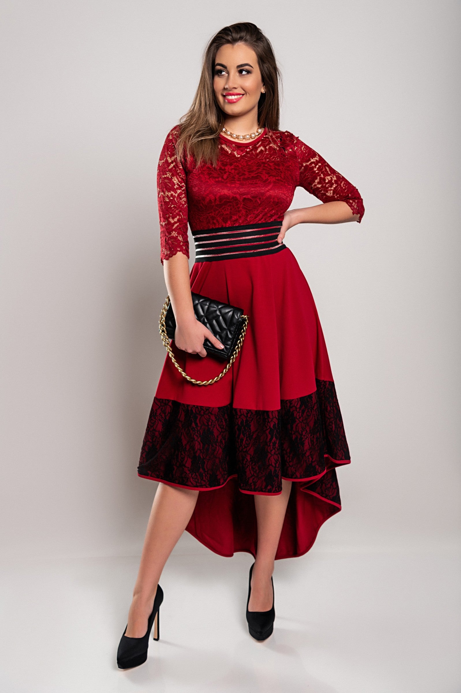 Elegant burgundy lace dress Bianca featuring asymmetrical design, sheer 3/4 sleeves, and lace detailing.