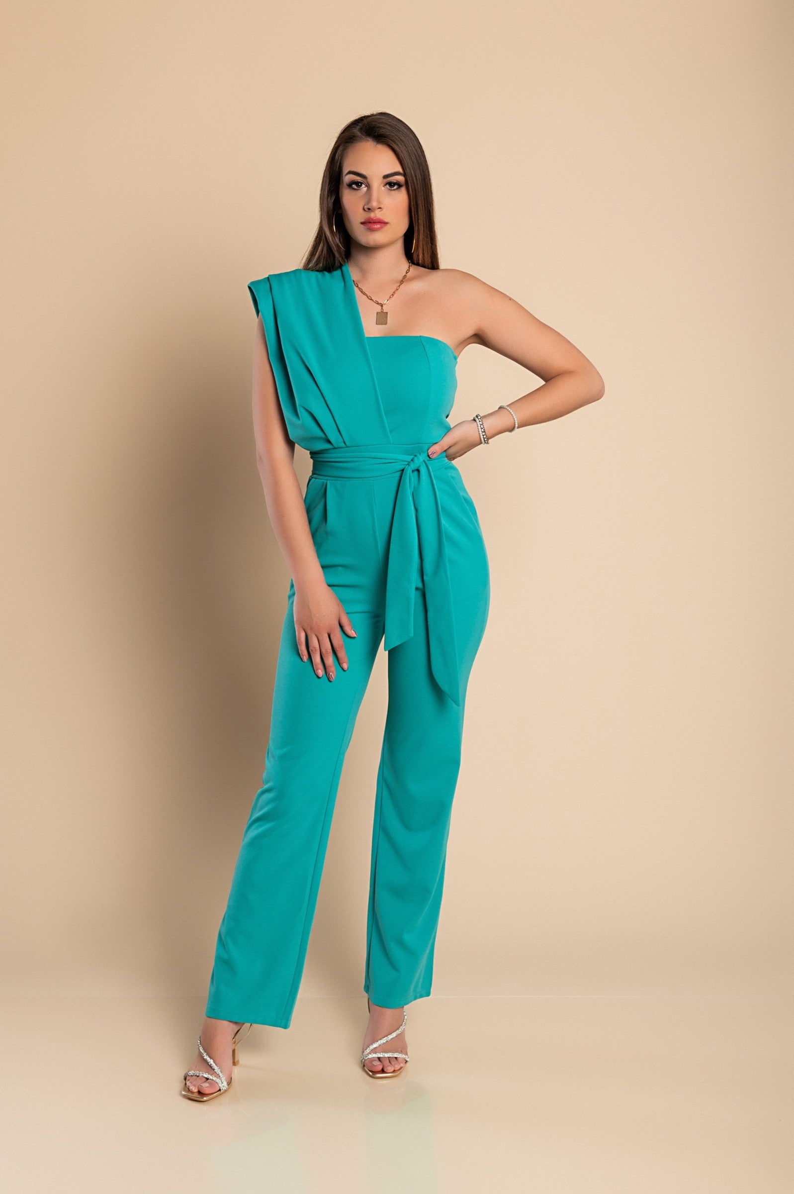 Elegant Mint Jumpsuit Chia featuring asymmetrical neckline and one sleeve, made from soft fabric with long loose pants.