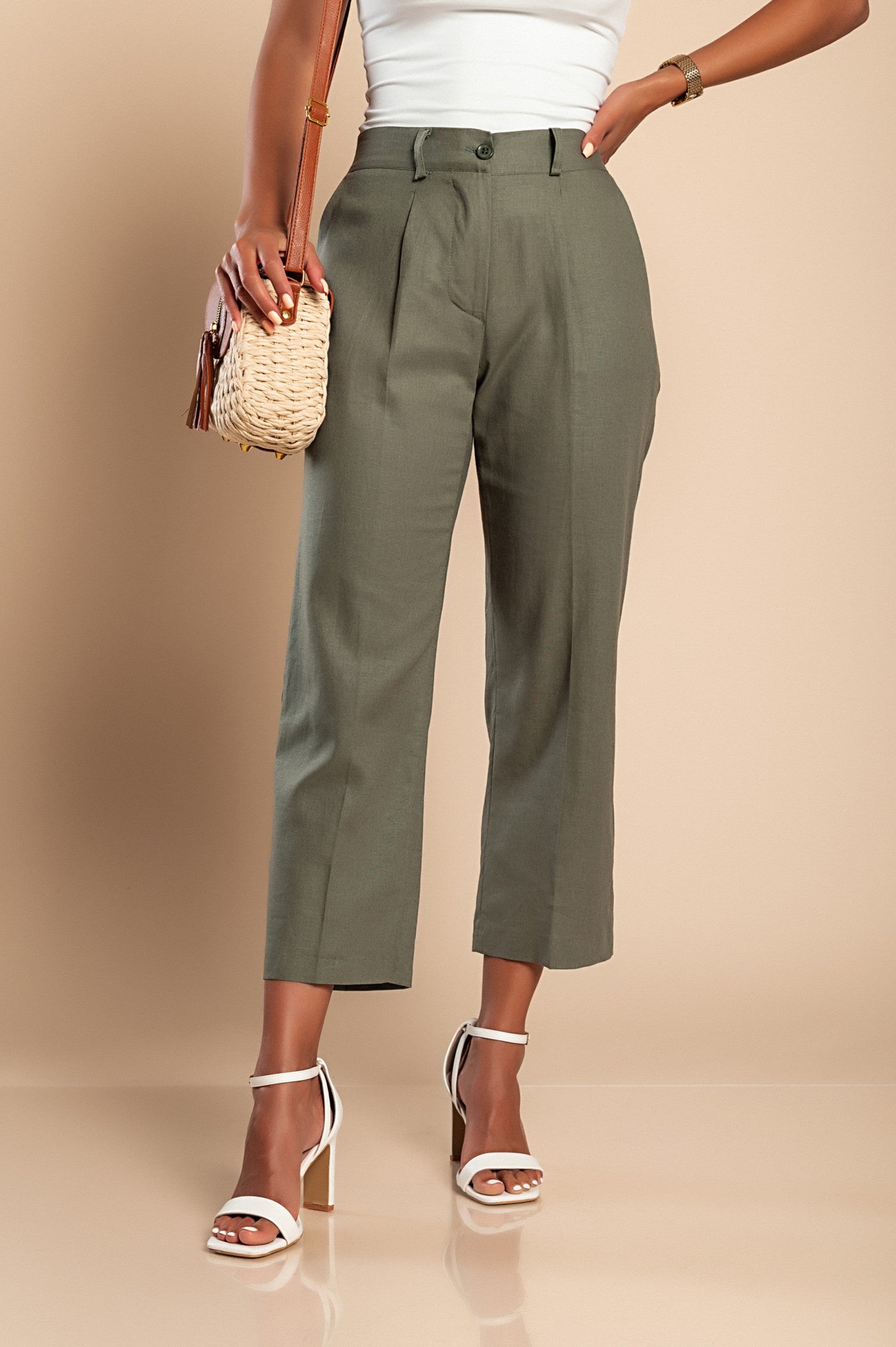 Elegant olive green linen trousers with straight cut and elasticated back, featuring side pockets, made in Italy.