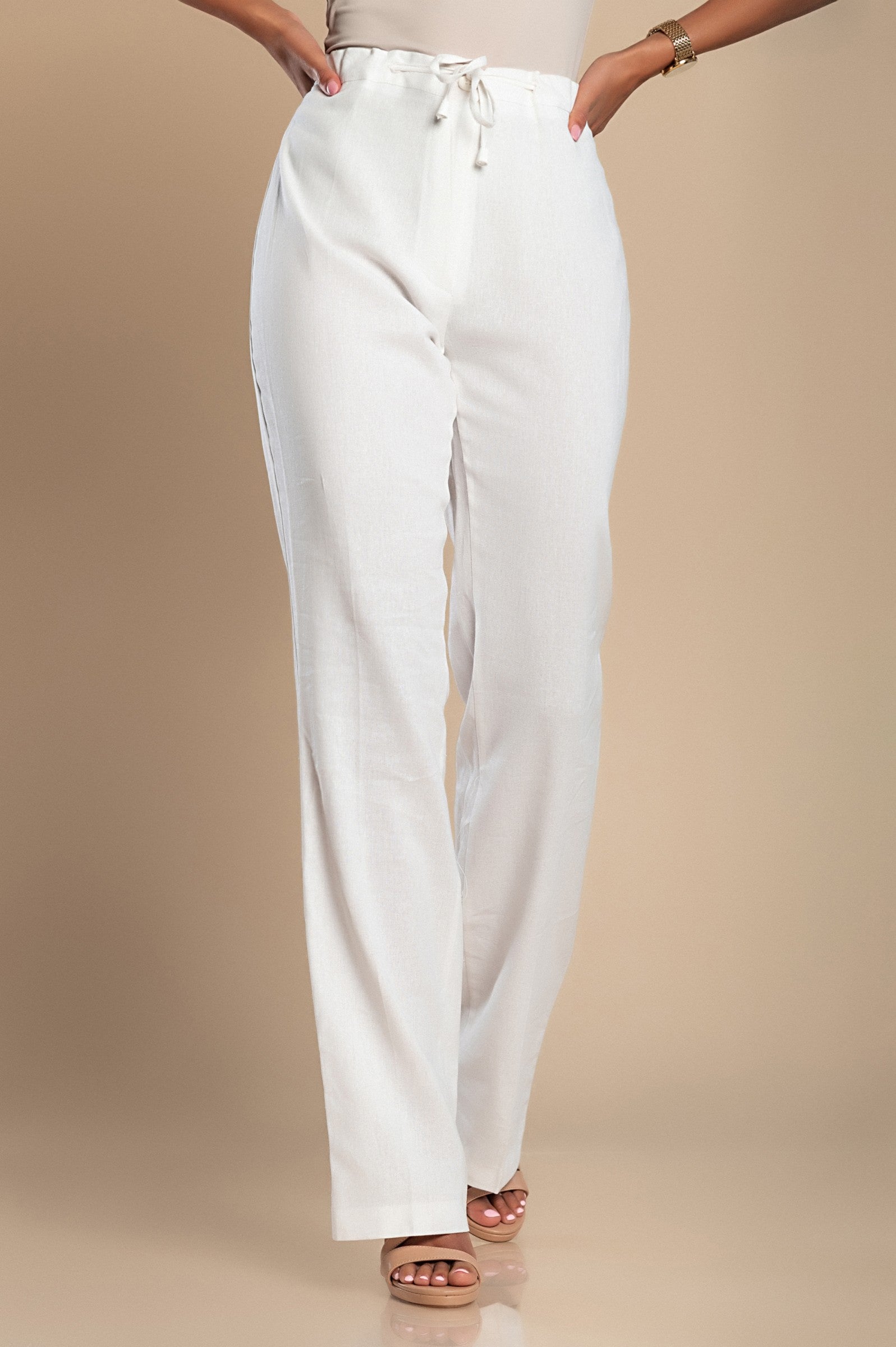 Elegant white linen trousers with a straight cut and drawstring waist, showcasing high-quality Italian craftsmanship.