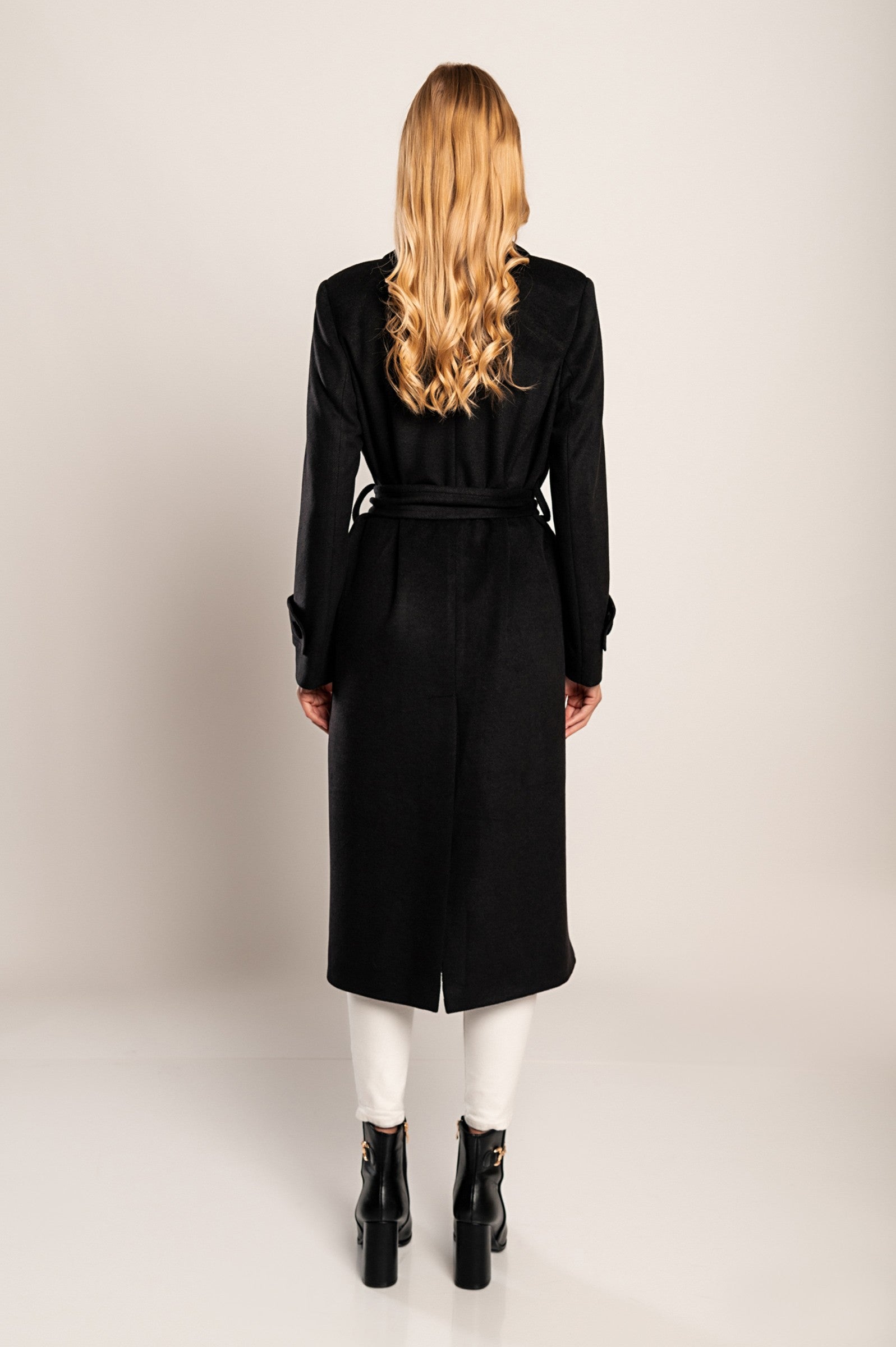 Elegant long black coat Canossa with classic collar and decorative belt, made of soft high-quality fabric.