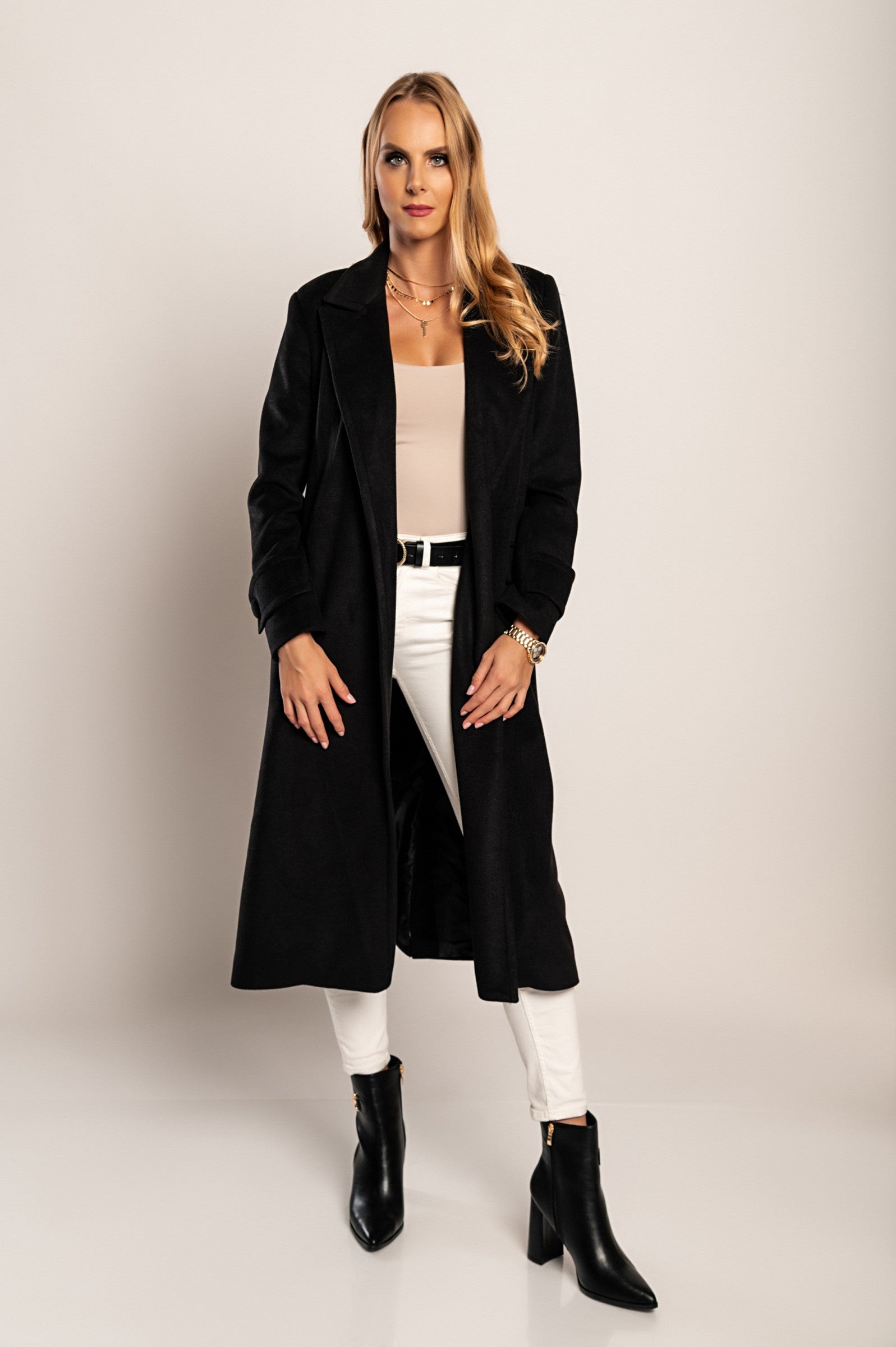 Elegant long black coat Canossa with classic collar and decorative belt, made of soft high-quality fabric.