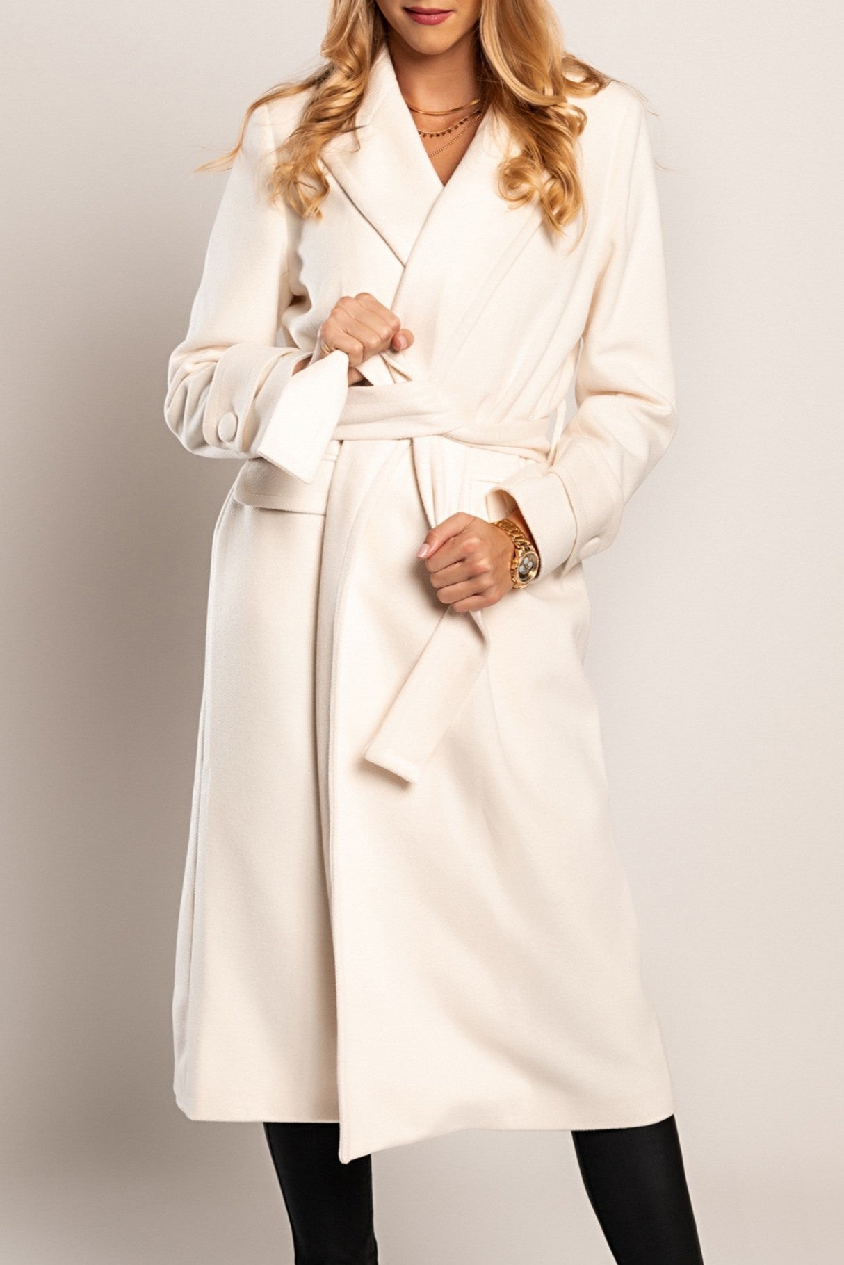 Elegant long cream coat Canossa with classic collar and decorative belt, made in Italy.