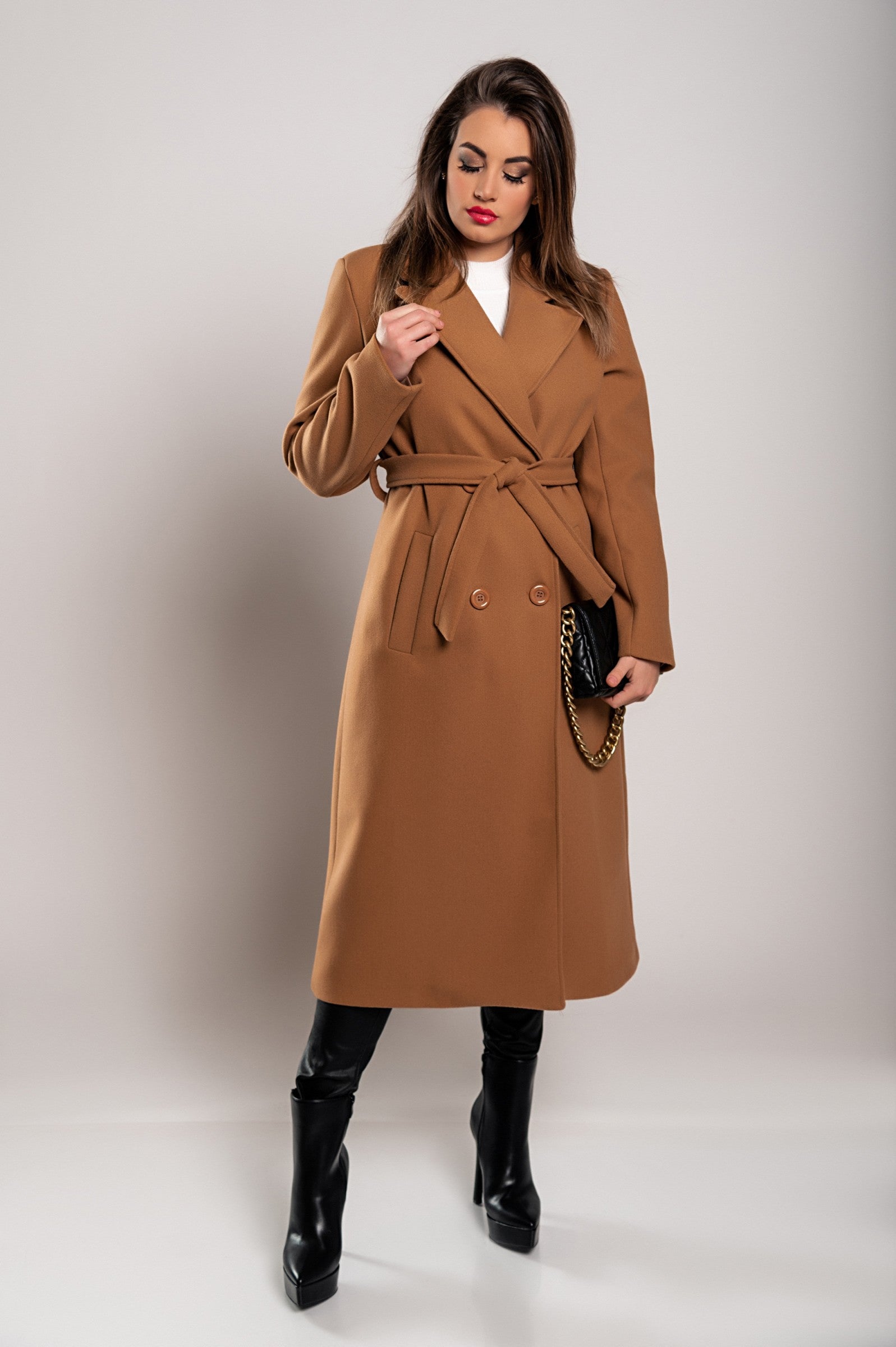 Elegant camel long coat with buttons, featuring a classic collar and decorative belt, perfect for stylish occasions.