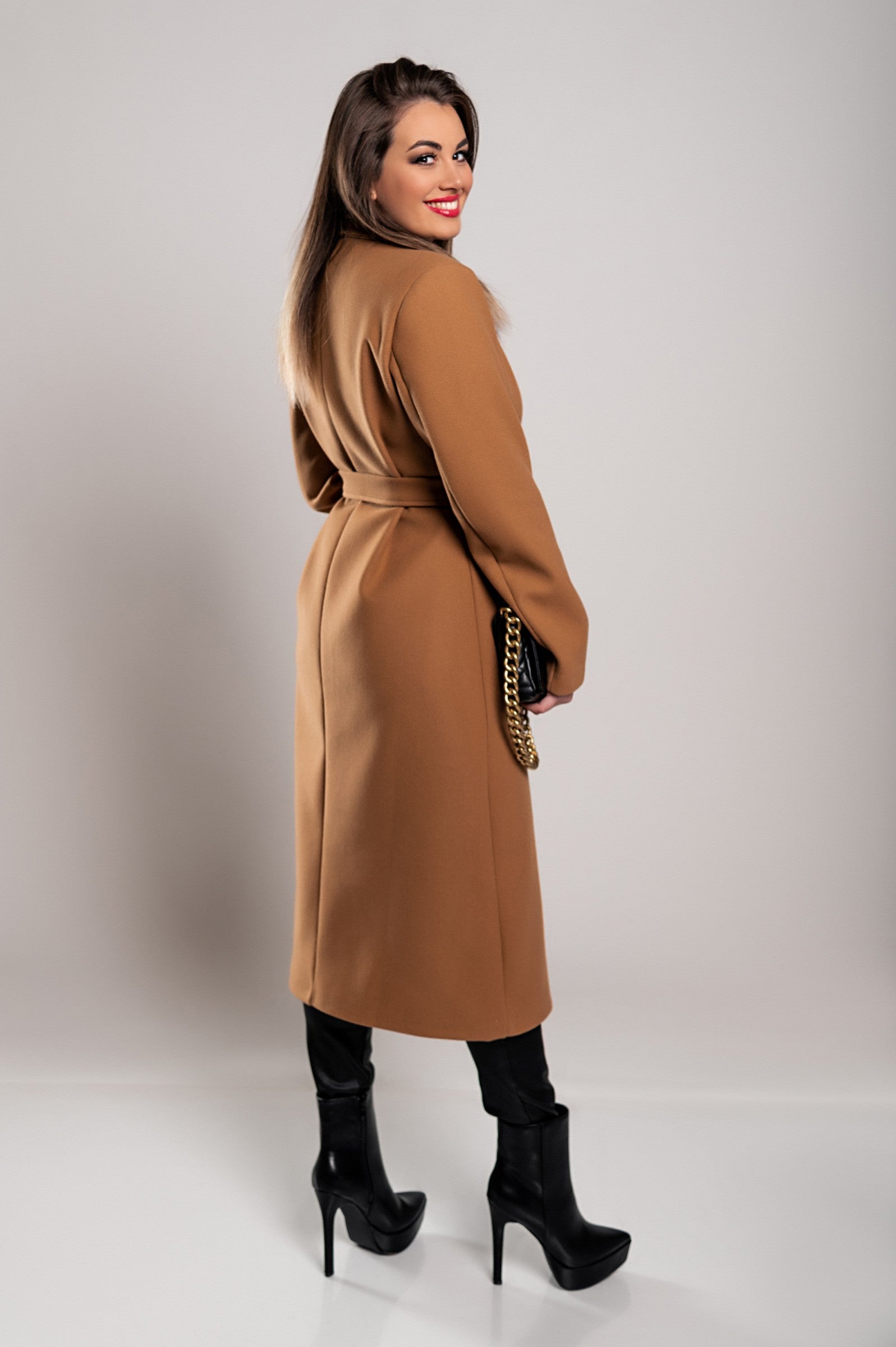 Elegant camel long coat with buttons, featuring a classic collar and decorative belt, perfect for stylish occasions.