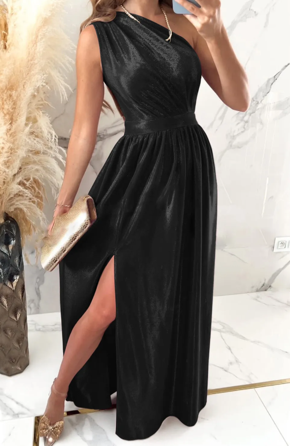 Elegant long black dress made of imitation velvet with asymmetrical neckline and slit skirt, showcasing a stylish and sophisticated design.