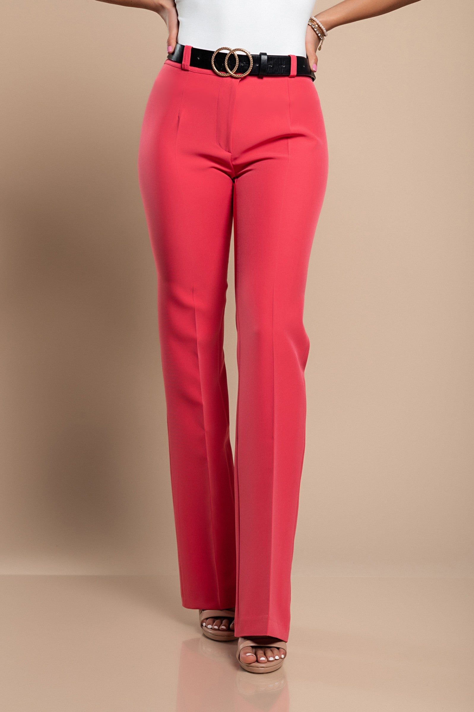 Elegant long straight-leg trousers in coral color, showcasing a mid-waist design with zip and button closure.