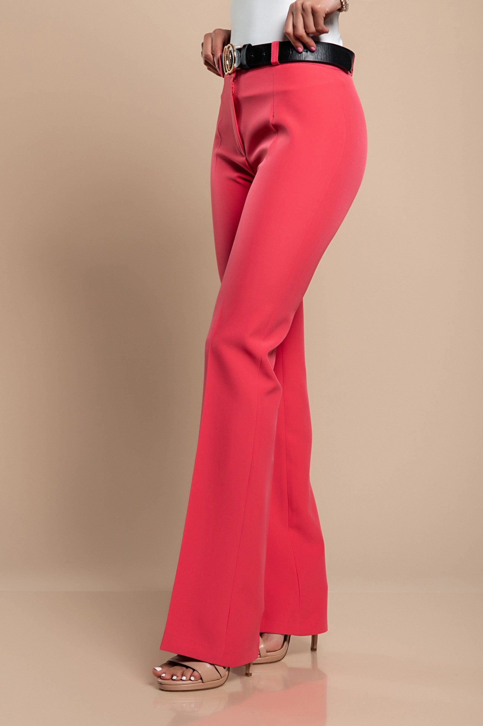 Elegant long straight-leg trousers in coral color, showcasing a mid-waist design with zip and button closure.