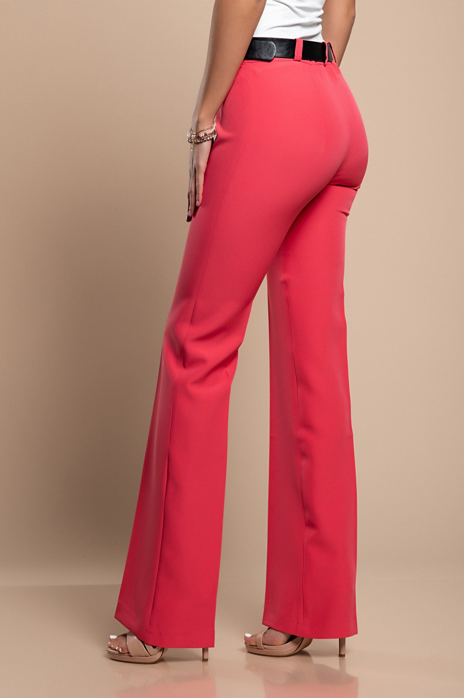 Elegant long straight-leg trousers in coral color, showcasing a mid-waist design with zip and button closure.