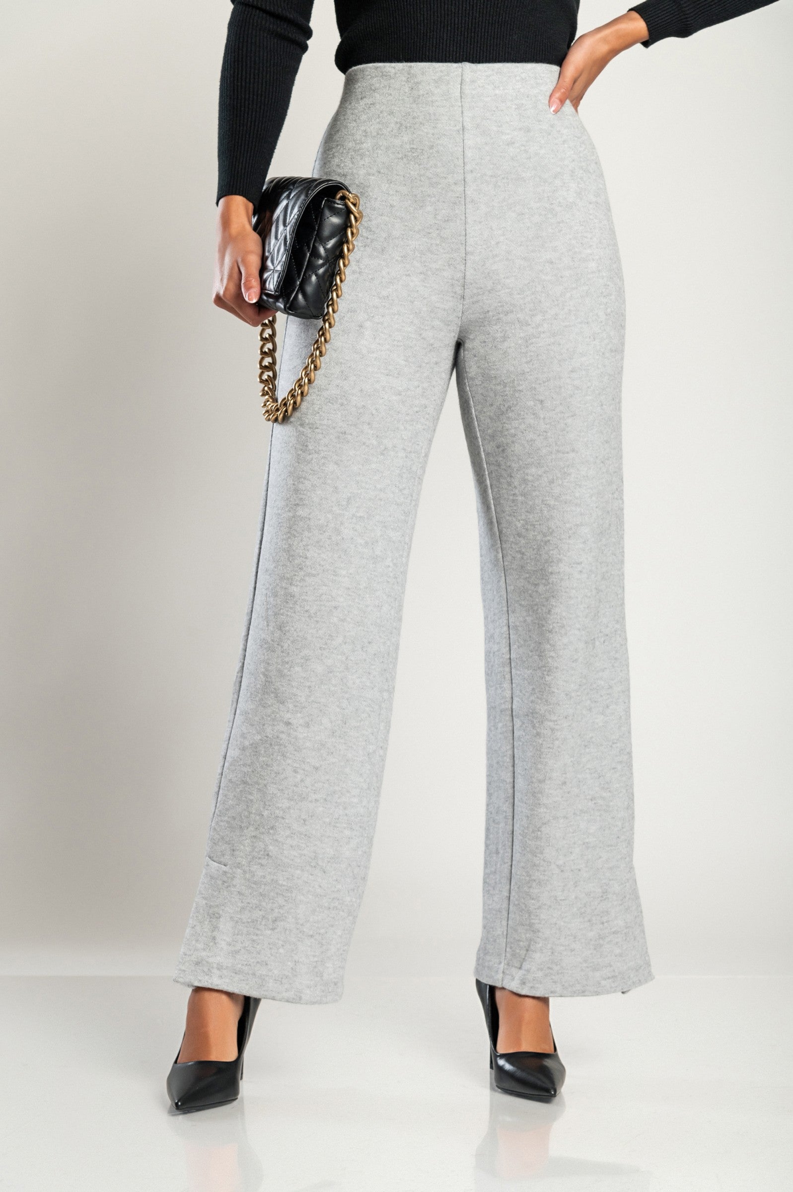 Elegant gray long trousers with straight leg and elasticated waist, made from high-quality fabric in Italy.