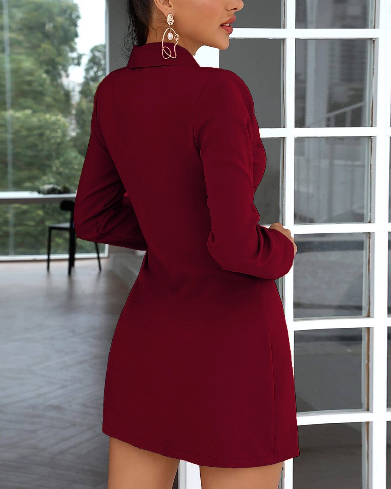 Elegant long-sleeved mini dress featuring a deep 'V' neckline, classic collar, and pleated skirt, perfect for various occasions.