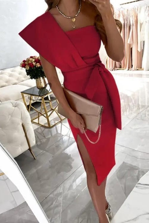 Elegant red midi dress Triona with asymmetrical neckline and fitted skirt, showcasing a stylish design suitable for various occasions.